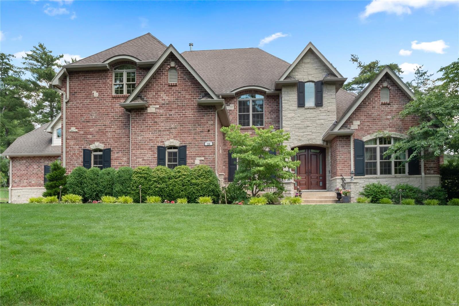 Welcome to this impeccably built smart home with fabulous living space on all three levels. This 5 bedroom, 5 full bath, two half bath home features hardwood floors throughout many of the living spaces including the walk-out lower level which features heated hardwood floors. The kitchen is a cook and entertainer's dream with a suite of Jenn-Air appliances and Wolf 4 burner gas cooktop. The main floor primary suite is grand in scale and walks out to the back patio. The upstairs features 4 bedrooms, 3 full baths and a large hallway closet that has been plumbed for a stackable washer/dryer. The walk-out lower level is a world of its own with a full custom kitchen that rivals any main floor kitchen, a full bath with steam shower, an exercise room, media room with 3 TV's, a see-through stone fireplace & plenty of storage. The property sits on 1 acre with room for a pool & has a whole home generator plus 4 car garage & extensive landscaping


This home has storage and organization galore.