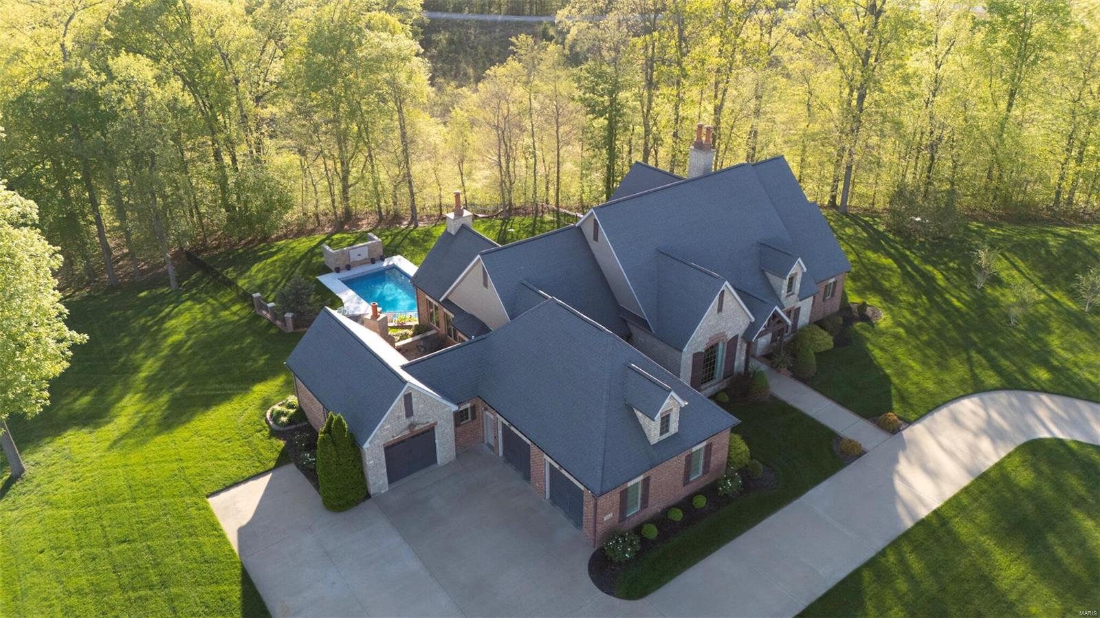 Stunning Custom Luxury Home in Windwood Lake Estates!
This one-of-a-kind 4-bedroom, 6-bath estate is built with exceptional craftsmanship and unmatched attention to detail. Every inch of it's 7,200 sq. ft. is designed for luxury, comfort, and entertainment.
As you walk in, you're greeted by a main floor boasting vaulted ceilings, two large living areas, a formal dining room, and an office/library space with elegant built-ins. The spacious primary bedroom features a luxurious, feature-rich bathroom. The lower level includes its own full kitchen, a giant living area, and a bonus rec room designed as a theater.
The brand-new heated and cooled sport pool is the perfect centerpiece for entertaining, accompanied by multiple outdoor seating areas. The fully irrigated yard is surrounded by meticulously maintained landscaping, creating a truly picturesque setting.

There are simply too many details to list - you have to see this extraordinary home for yourself!