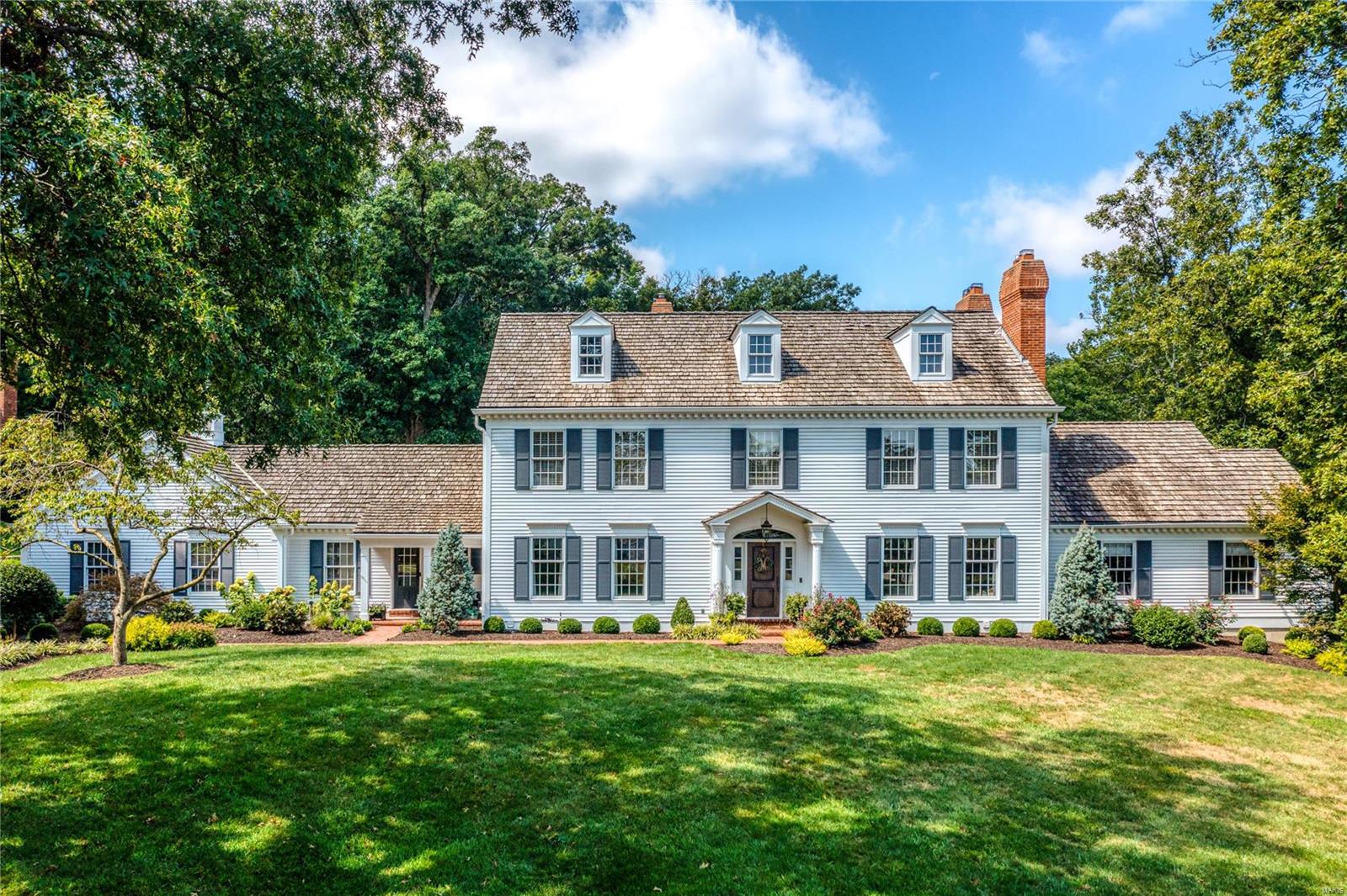 Stunning estate home centrally located yet privately secluded on a spacious & glorious lot in Town & Country. Backing to Longview Farm w/its welcoming trails & wildlife, it's vacation every day at this luxury home which has been lovingly updated & reimagined down to the smallest detail by DeBrecht Custom Homes. Stunning curb appeal; cozy yet grand, the creative use of indoor & outdoor space allows for intimate gatherings & the most impressive of grand scale entertaining. Beautiful, warm kitchen appealing to the gourmet, lg dining & living rooms, main floor luxury suite, home office with French doors, 4 season room opening to breathtaking patios & pergola; this is just the start. Upstairs find 4 generous bedrooms & 3 full baths; the LL opens to the garden and includes workout space, full bath w/sauna, a second kitchen, fireplace & gathering room. A surprise around every corner, this home is a must-see. This is the one you've been waiting for. Additional Rooms: Mud Room, Sun Room