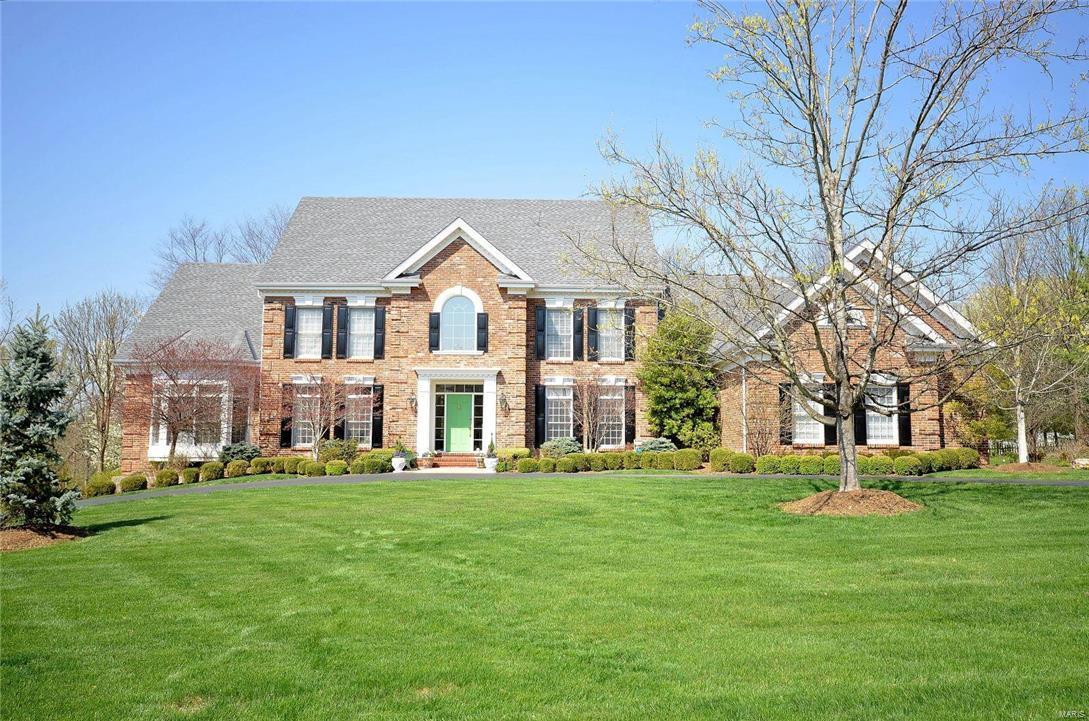 Immaculate Johnson Built Custom Home on 1.1 acre private wooded lot, only minutes to 3 major hospitals, 5 private schools and Parkway Central!  Over 6600 SF of finished living area.  One story and a half, with covered loggia, circular driveway, 5 bedrooms, 4 1/2 baths, 3 fireplaces, 2 wet bars, 3 car garage and new outdoor kitchen! New roof in 2013, two new HVAC units in 2014, updated kitchen with granite, stainless steel Dacor appliances, and hardwood floors. Gorgeous Master Suite has built ins, vaulted ceiling, double sinks, jacuzzi, his and hers closets, make up vanity and stone shower! Hearth room with floor to ceiling brick fireplace and wall of built in bookcases is welcoming and opens up to breakfast room and kitchen which is great for entertaining. Professionally finished 2,000SF+ lower level with side walkout, bedroom, exercise room, fireplace, wet bar for guests, nanny, or in- law suite.  Fresh paint and all new carpeting on second floor.  Exceptional Value in Great Location!