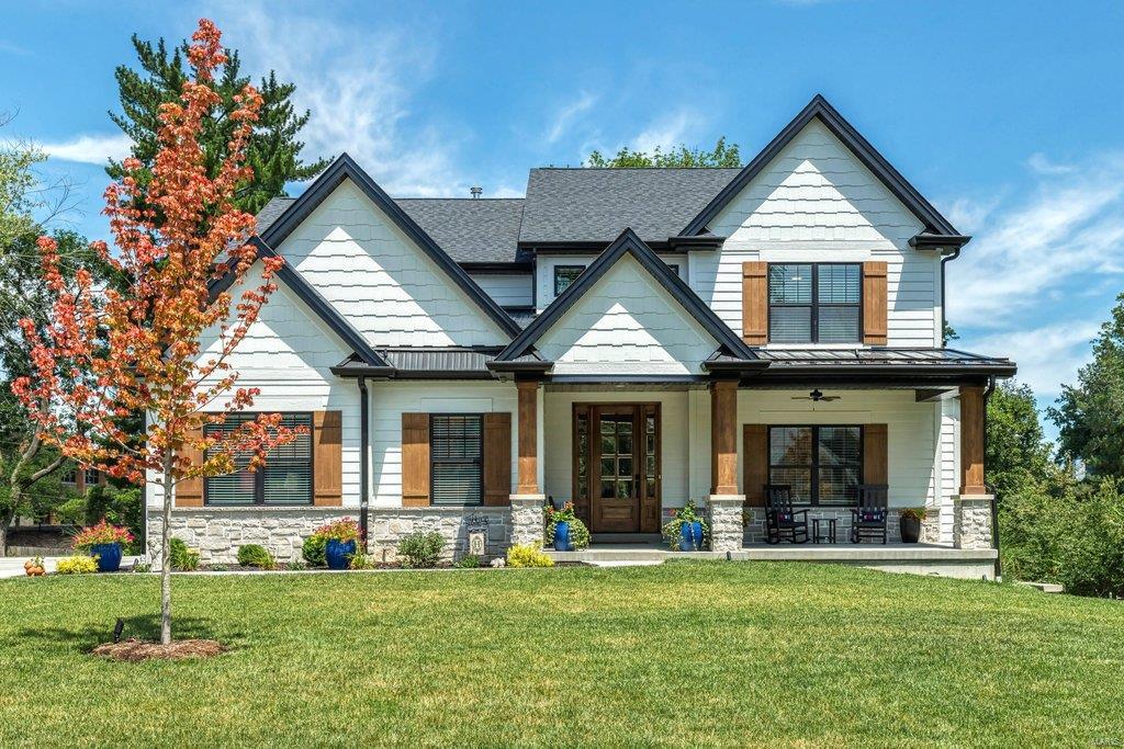 Sophisticated Pentrex-built 1.5 Sty just completed in late 2021. Distinctive design elements & upgrades including wide plank oak flooring, detailed trim work, transom windows & integrated sound system are featured throughout the home. Impressive entry foyer leads to formal dining room & stunning great room with 12’ box beam ceiling & floor-to-ceiling stone fireplace flanked by built-in storage cabinets. Designer kitchen with white Shaker cabinetry, quartz countertops, KitchenAid appliances & 9’ center island adjoins light-filled breakfast room with sliding glass door that opens to screened porch & adjacent deck. Coffered master bedroom suite with luxury bath with shower spa offers an appealing retreat. Oak staircase accesses 3 additional bedrooms, 1 with ensuite bath & 2 with Jack n’ Jill bath, bonus room & 2nd floor laundry. Walk-out Lower Level includes recreation room, game room with sliding glass door to patio, 2nd kitchen, 5th bedroom & guest suite. St. Clement is just steps away. Additional Rooms: Mud Room