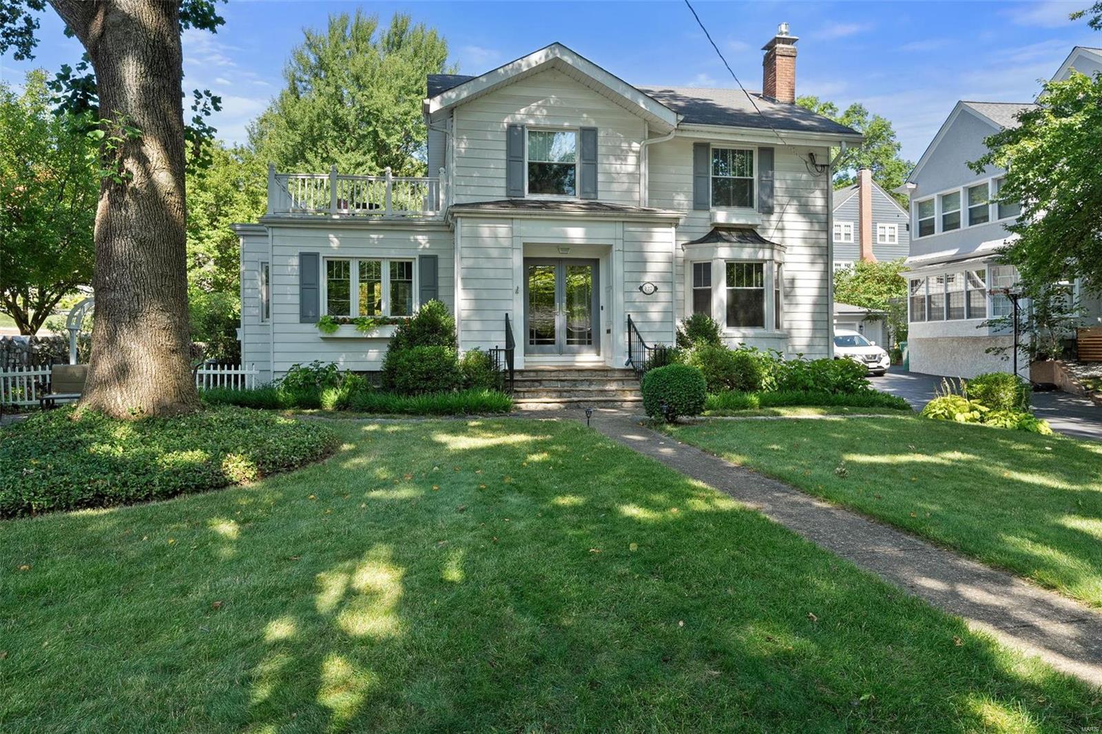 You can have it all! Steps from Old Webster, sophisticated and family-friendly 4 bedroom, 2.5 bath home situated in a serene, park-like setting. Step inside the double doors to the entry with half-bath that opens to the large, bayed living room with fireplace flanked by glass front cabinets. Off to the left is the light-filled, cozy sunroom with a box-bay window seat. The living room opens to the ample dining room with built-in buffet, then flows to the hub of every home, the well-planned kitchen and family room, where three different doors lead to the fabulous outdoor spaces nestled in the lush, thoughtfully landscaped yard. The T-staircase, accessible from the living room or kitchen ushers you up to the bedrooms and full baths, one of each comprising the vaulted primary suite. One bedroom even has a private, outdoor porch where morning coffee tastes better. Partially finished lower level has two nicely finished rooms, laundry area and plenty of storage space. Come see for yourself! Additional Rooms: Sun Room
