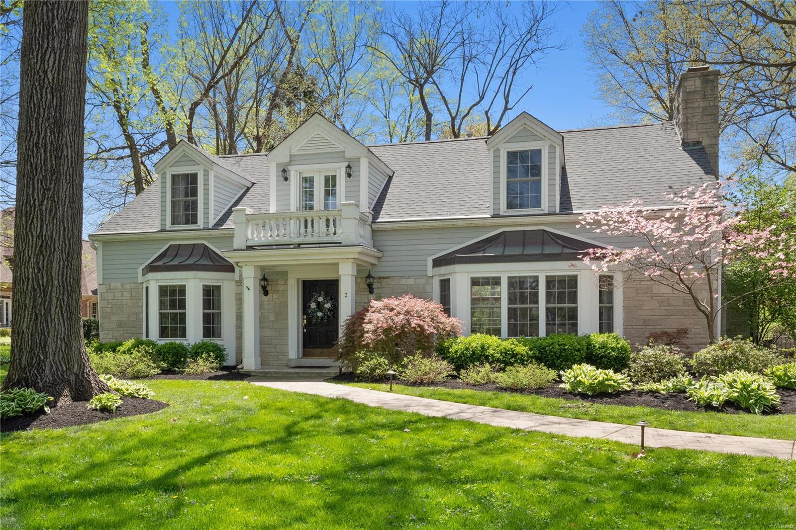 Updated and expanded in 2003, this charming 4 bdrm, 3.5 bath home is ideally situated on a lush .74 acre lot in picturesque Frontenac Estates overlooking the beautiful Villa Duchesne and Oak Hill campus.  Find both formal and informal living perfect for today’s busy lifestyle.  The living rm with fireplace and built ins and the formal dining rm with bay window are perfectly appointed off the foyer.  The kitchen with butler pantry, center island with seating offers custom cabinetry, and granite countertops,  flows seamlessly into the light filled family rm with vaulted ceiling, fireplace and builtins.  A main floor master suite with his/her walk in closets and luxury bath with multihead shower and jetted tub.  Upstairs find a bedrm suite, 2 other large bedrms, one with an extra rm for sleepovers, storage etc… and a hall bath.  Gleaming hardwood floors, beautiful landscaping, private brick patio, 2 car garage and more are complete this home.  Ladue schools Additional Rooms: Mud Room