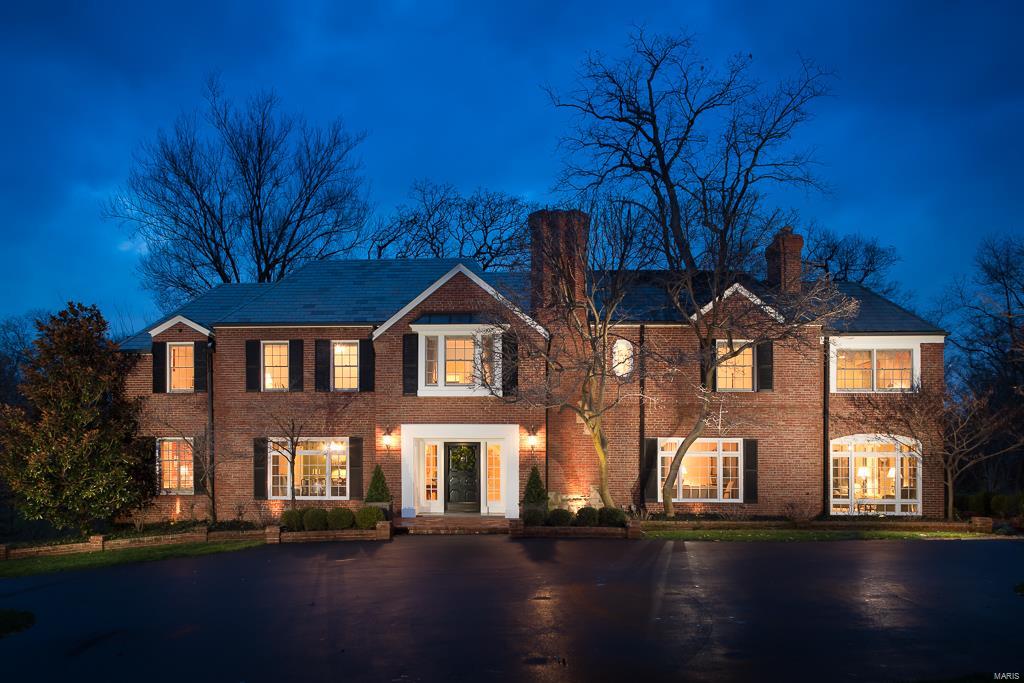 OVER 700K+PRICE REDUCTION. A MUST SEE!
With a majestic 3+ acre park-like setting in Ladue schools, this home boasts 5 Bedrooms, 7 Baths.  Inviting curved staircase, wood floors, exquisite moldings & ceiling medallions are a few hallmarks. The Living Room and Dining Room, each with sitting rooms attached are perfect for entertaining or just to cozy up with a book. An over sized Kitchen offers an abundance of cabinets, center island breakfast area, boxed beamed ceiling and more. A large family room w/ built ins, fireplace and wet bar overlooks and walks out to terraces, wooden bridges, and scenic landscaping. Enormous 2nd floor master suite with separate his & her bathrooms and adjoining over sized family room with fireplace. 4 Additional bedrooms and 2 baths complete the 2nd level. The Lower Level offers a recreation room, full bath, fitness room and abundance of storage. If that weren't enough, a pool, pool house and Gorgeous Hartley Botanic greenhouse complete this masterpiece.