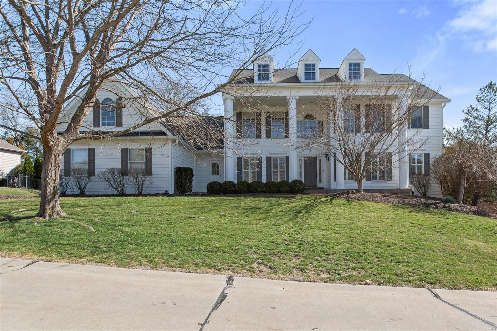 Welcome to this beautifully maintained, gorgeous home nestled in the Pine Creek neighborhood. A generous entry greets you & immediately you will notice the hardwood floors, plantation shutters & moldings. A dining room is on your left & an office or sitting room on your right. Ahead is an outstanding great room with amazing windows, a gas fireplace & convenient bar with a beverage fridge. The kitchen is updated and offers pretty cabinets, stainless appliances, an island, eat-in space & a family room that walks out to the deck. Also on the main floor, a laundry room, powder room & impressive primary suite with a walk-in closet. Upstairs are 3 good size bedrooms with great closet space, 2 full baths & a bonus loft space at the top of the stairs. The lower level has a recreation room with a bar/cabinet space, a bedroom, bath, office & bonus/gym space. The rear yard is incredible with a great pool/pool deck, newer hot tub & spectacular plantings, landscaping, there's also a 3 car garage!