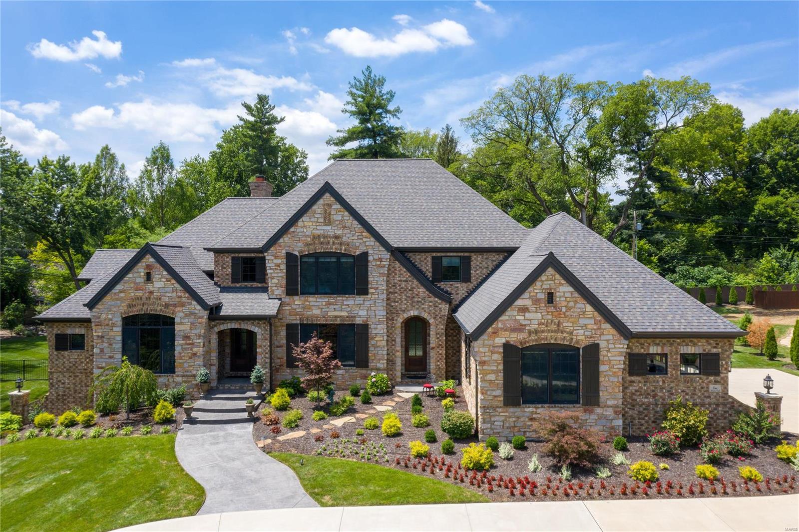 Custom 4-year-old home in Ladue on a secluded 1.4-acre lot.  Situated in an enclave of newer construction homes, 1 Briar Oak boasts over 5300 sq ft of luxury finishes that a buyer would expect in a new home.  The open floor plan highlights walnut flooring throughout.  A large kitchen with custom cabinetry, center island, custom walk-in pantry, Thermador appliances, opens to a family hearth rm with stone fireplace overlooking the covered patio with gas fire pit and custom pool and level backyard.  A formal dining rm with butler's pantry and living rm with gas fireplace are perfect for entertaining, while a large office with builtins allows for a quiet workspace.  You will also find a luxury master suite complete with soaring ceilings, spa shower, dual sinks, and his/her closets.  2 powder rms, a large laundry/mudrm complete this 1st floor.  3 light-filled bedrm suites, a large 2nd fam/rec rm with fireplace and a 2nd custom laundry rm complete the 2nd flr.  4 car gar, look-out low level. Additional Rooms: Mud Room