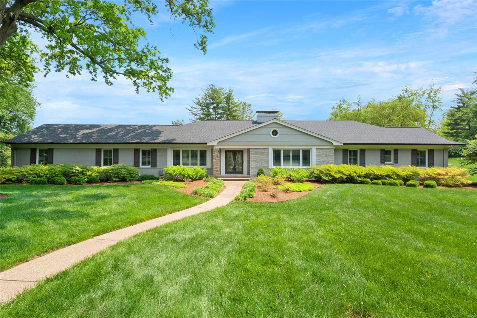 Experience the epitome of luxury living with this 4 bed 4.5 bath home on a gorgeous 1 acre+ lot. Hardwood floors throughout the main floor exude warmth and sophistication. Each bedroom boasts its own en suite bathroom, ensuring privacy and comfort for everyone. The primary bathroom has the convenience of two walk-in closets and a double sink, a stylish addition that enhances your daily routine. Newer leather granite countertops in the main kitchen add a touch of elegance along with the natural light from the multitude of windows, creating a bright and inviting space. The bonus kitchen in the walkout lower level adds versatility and flexibility for various needs, including an extra bedroom, living room, office, etc. Heading outside you’ll be greeted by the fenced in backyard with a newer composite deck that overlooks the pool, providing a picturesque setting for relaxation and entertainment. This exceptional home delivers unparalleled comfort, style, and functionality. Don't miss out!