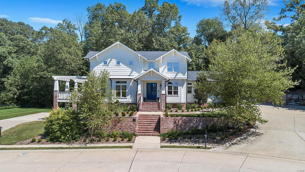 This home & its amenities cannot be described in this space so please see the list of amenities attached to this listing!! Craftsman style two story home offers five bedrooms, 6 1/2 baths, great room with 19' ceilings, garages with hvac to accommodate six vehicles, mud room with library ladder to access storage lockers; laundry room, awesome dog room also exits to exterior dog run; amazing gourmet dream kitchen & butler pantry with refrigerator, freezer & ice maker.  The main level master suite is beautiful & full of amenities.  The elevator accesses all 3 floors.  The exterior of the home offers composite decking, in-ground saltwater pool with baja entry, built-in hot tub & waterfalls, fireplace, in-ground trampoline, extensive lighting & surround sound system.  The interior flooring is easy care slate, beautiful hand-hewn wood & ceramic tile.  The media room has its own wet bar!  The electronics in this home are truly a work of art. All TV's stay.  All measurements are approximate. Additional Rooms: Mud Room