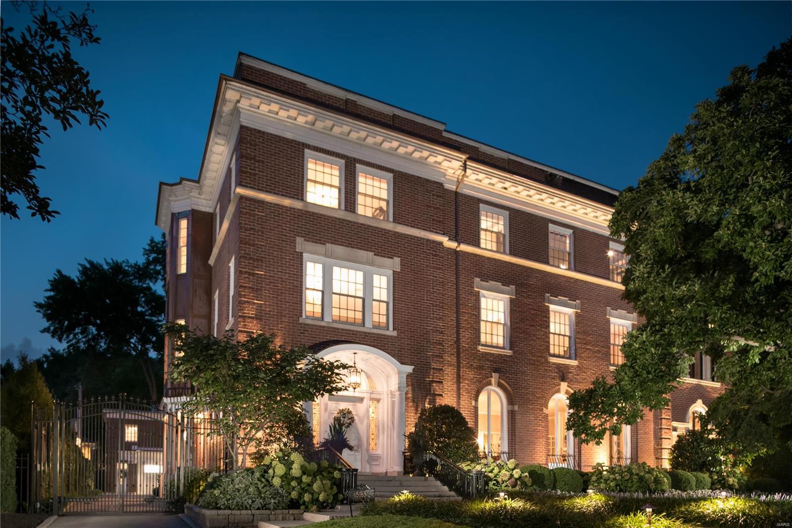 St. Louis Magazine's "Most Beautiful Home in Saint Louis", 2019. A Mariner & LaBeaume design, repositioned into the Modern Age. With a functional age of 5 years old, every detail has been touched. Run the entire house from an iPhone via Savant mobile app. NEW: Roof/gutters/downspouts ($300,000+), Energy/sound efficient windows ($300,000), landscaping, interior/exterior lighting, all wiring/electrical/plumbing& tuckpointing. Security systems. Surround sound, throughout. Master suite w/spa-inspired bath. Sub/Zero/Wolf Chef’s kitchen. Motorized gate on drive. Flooring, all redone or new. Perfect Millwork/plasterwork restoration. All fireplaces work (gas or electric). 3rd level entirely for fun: theater, massage room, loggia, 2nd kitchen, terraces, and hot tub. Extravagant, private grounds, saltwater pool, patios and outdoor fireplace. Carriage House. Oversized heated/air conditioned garage. Across from Forest Park. Walk to restaurants, shops, and medical centers. Just a really cool pad!