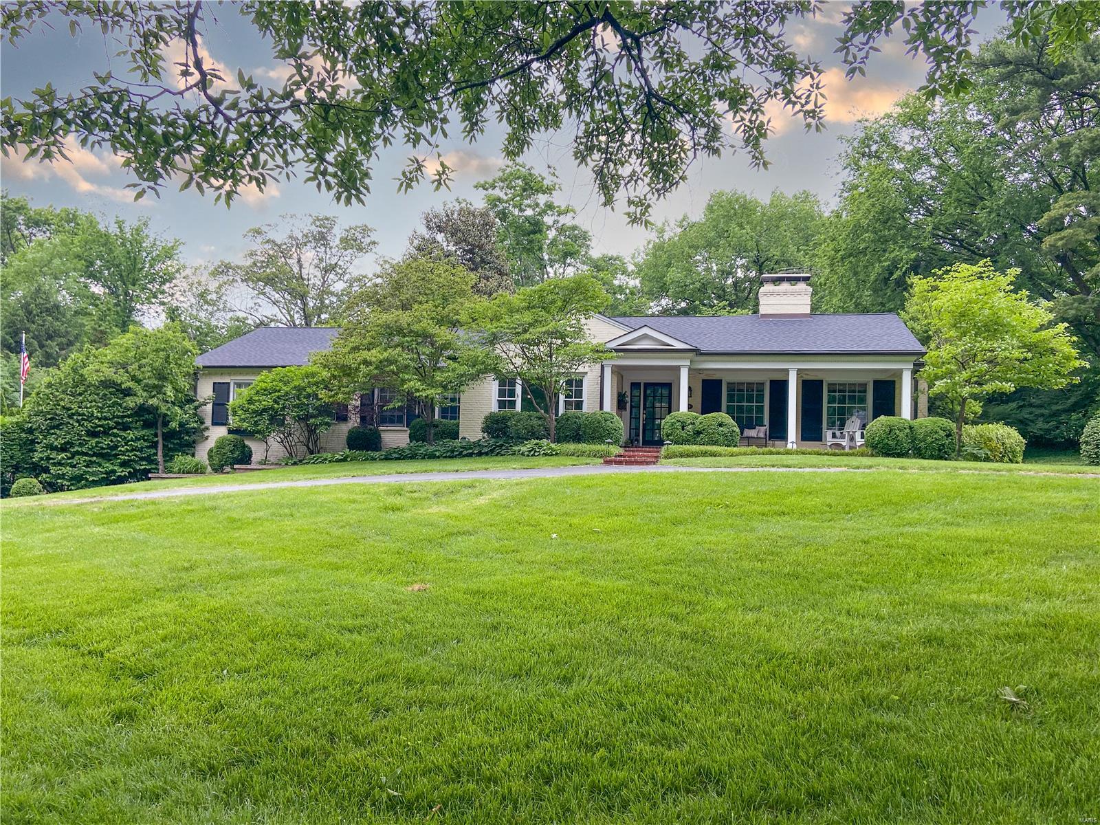 Step into this beautiful 5 bedroom + 4.5 bath Ranch situated on 1.8 acres in the heart of Ladue. Off of the entry foyer you will find a formal dining room and family game room. Gorgeous paneled study with fireplace off of the formal living room (used as family game room). The floor to ceiling windows in the kitchen provide ample light for a meal at the breakfast bar or center island. Directly off the kitchen is a lovely hearth room with built in cabinetry. The private master bedroom suite offers a fireplace, a large walk-in closet, private patio access and a bathroom complete with heated floor, jacuzzi tub and separate steam shower. The completed lower level includes a fitness area, family room, full bath and access to the 3 car garage. Newer Roof, water heater and main AC unit. The backyard pool and patio oasis are what dreams are made of. This extremely private setting will not disappoint!