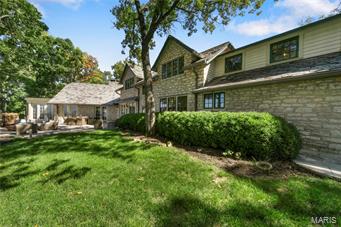 Situated on 5.3 acres of lush greenery with breathtaking panoramic views of the Missouri River in St. Albans. 901 Wings Rd epitomizes privacy and exclusivity. Constructed in 1926, this property once served as a social and sporting club for St. Louis’ elite. Today this 5 bedroom, 4 bathroom home provides all of the modern comforts you desire while maintaining the elegance and history of the residence. The Wings hosts a seemingly endless list of amenities from top of the line Viking, Sub Zero and Miele appliances to a personal Tee Box! You will love entertaining guests under the stars on the magnificent flagstone patios with incomparable views or in your very own private pub. The detached carriage house boasts a spectacular 932 SF loft apartment with cathedral ceilings and wood flooring. Photos simply do not do this home justice. You will be stunned by the freshly updated interior and historic remnants throughout the sprawling 5,985 SF Estate, highlighted in the virtual tour video.