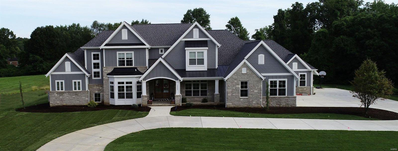 This TBB custom home boasts brick and stone exterior with a 3 car side entry garage, Designer Kitchen with Custom Cabinets, Energy Star Stainless Steel Appliances, a 36” Gas Range, Granite Counter Tops, and a Walk-In Pantry. The spacious Great Room features a Gas Fireplace with Wood Mantel. The Master Suite includes a Coffered ceiling and Luxury Master Bath with Adult Height Vanities, Granite Countertops, Soaking Tub and Custom Shower. The Second Floor provides three junior suites, each with full bathrooms and walk in closets PLUS and large recreation/flex room. With Stringent Construction Practice and Attention to Detail, Vanderbilt Homes will provide you the Quality and Style you are looking for in your New Custom Home. ADDITIONAL FLOOR PLANS OR THE OPTION TO MODIFY AND CUSTOM DESIGN YOUR OWN HOME AVAILABLE! Additional Rooms: Mud Room