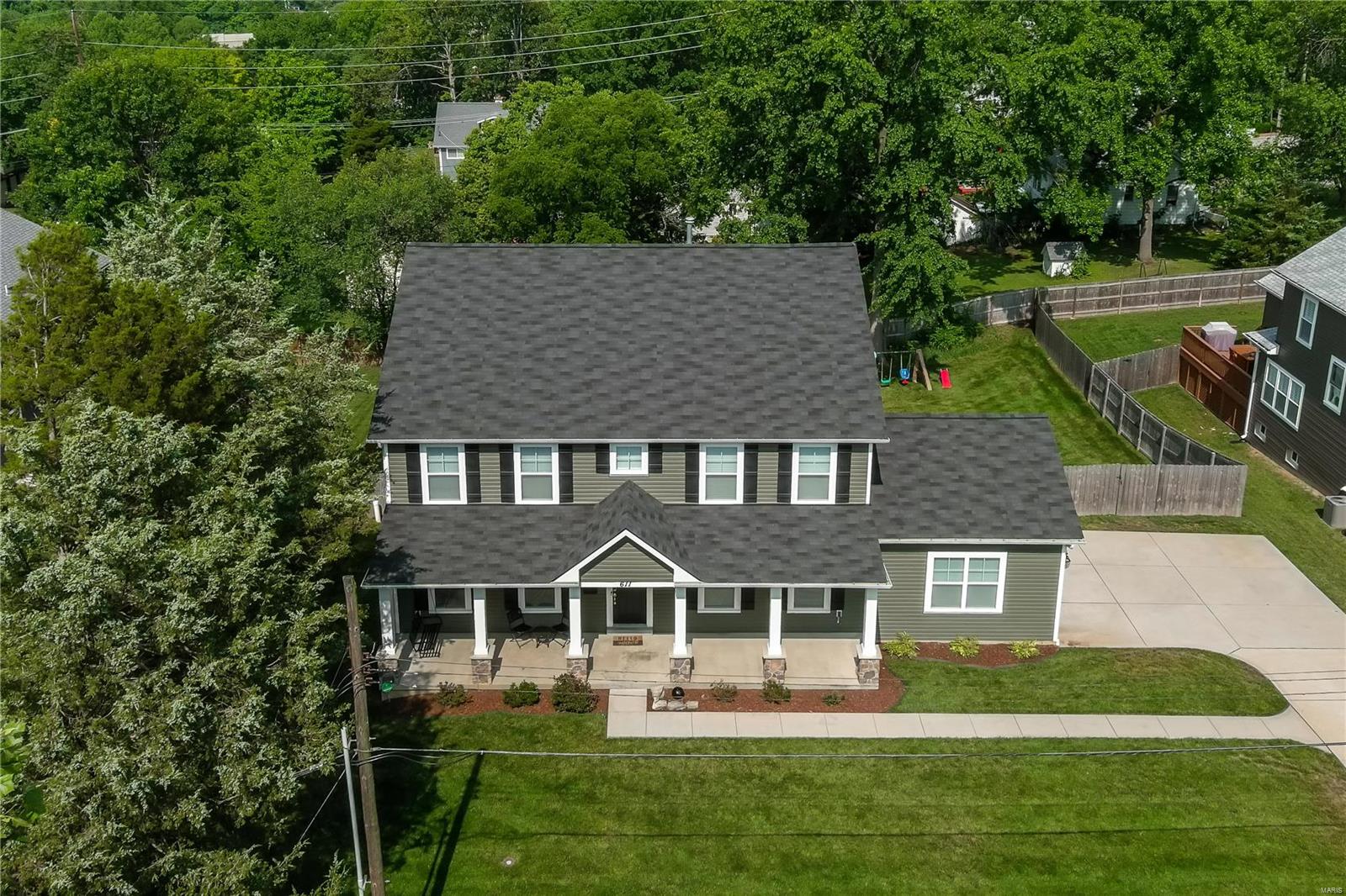 Why build?  Move right in to this 5 year NEW, 5 bd, 3.5 ba, 4400 sq ft home with one of the largest yards in Kirkwood.  Just SOME of the upgrades include:  wide plank wood floors, designer grade fixtures, stainless appliances, three zoned new HVAC...all accenting the modern open floorplan that buyers crave.  An extra-large family rm with stone gas fireplace perfect for entertaining or a relaxing evening in.  A large office, powder rm and mudroom round out the first floor.  The spacious upper level offers a gorgeous master suite with walk in custom closet and upgraded spa bath, laundry room, 3 additional bedrms and an extra-large double-sink bathroom with 2 separate bath/shower rooms and water closet.  The newly finished walk out lower level with full gym, custom wet bar, in-ceiling surround sound, custom 300+ bottle cedar wine cellar, 5th bedrm, and full bath expand this generous home.  Fenced in huge backyard, irrigation system, large deck, epoxy garage floor and so much more. Additional Rooms: Mud Room, Wine Cellar