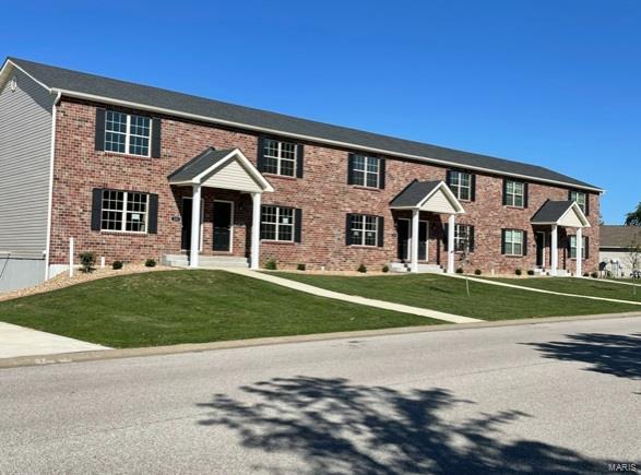 Great investment opportunity in Waterloo. Brand new 6 unit apartment building in desirable Waterloo location. Each of the 6 townhoms have two bedrooms, 1.5 baths and include a private 2 car garage. Upgraded features include stainless appliances, glass backsplash with under cabinet lighting. White interior trim, 5 1/4" baseboards and hard surface flooring with exception of carpeting in bedrooms. Vaulted master with ample closet space. Small deck off kitchen. Also includes two optional locations for washer and dryer. *CAN BE SUBDIVIDED INTO CONDOMINIUMS*