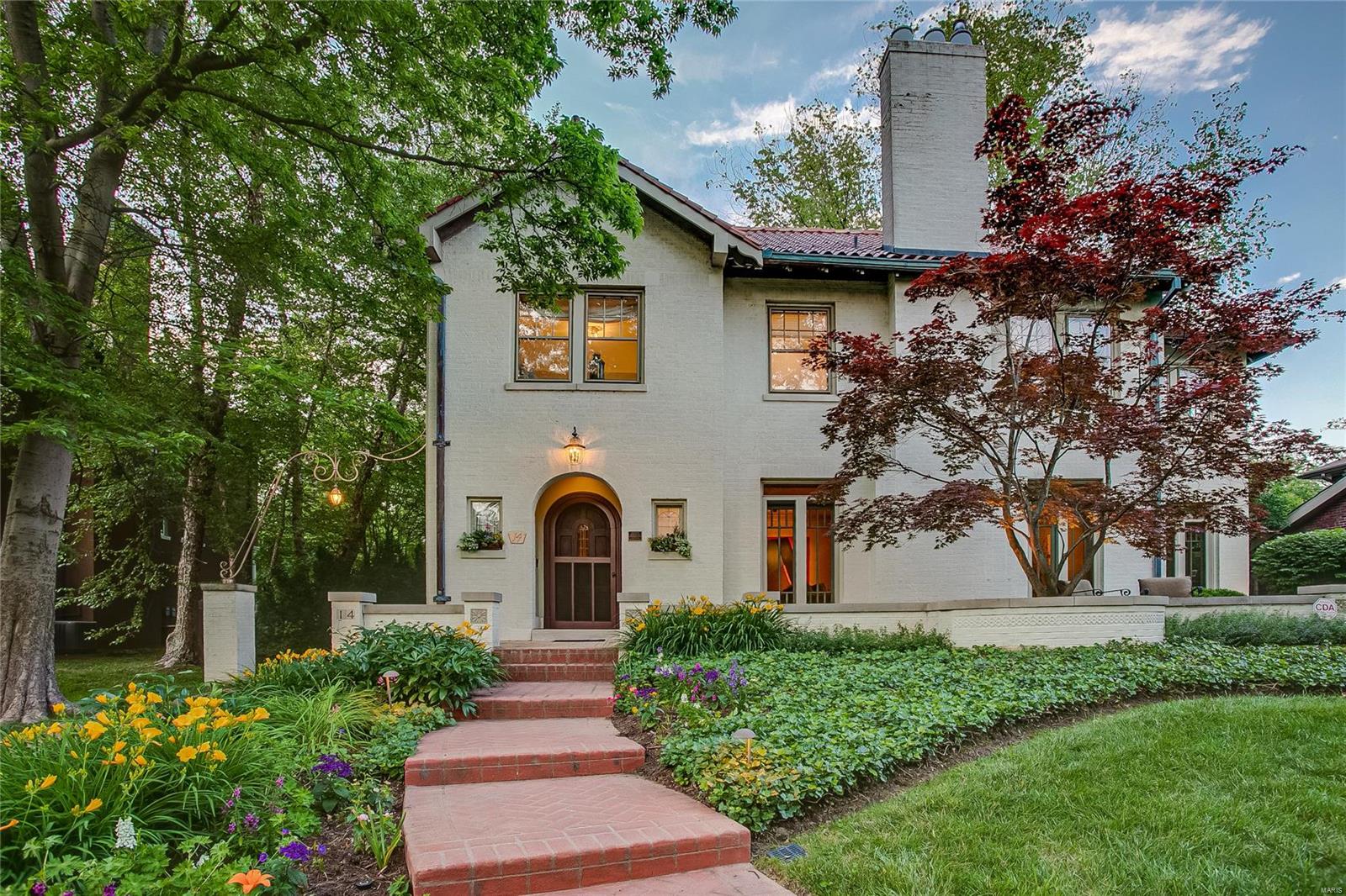 One of the prettiest homes in Claverach Park, this stunning and gracious 2 1/2 story beckons. Brick-patterned pathway leads to lovely entry terrace, the perfect place to unwind and take in neighborhood activities. Elegant formal living room, spacious formal dining room, charming sunroom, and large family room addition with walls of windows and spiral staircase. Newer white and Carrera marble eat-in kitchen. On the second floor, the master suite offers a private, remodeled bath and access to the home office. Two more spacious bedrooms, a newer full bath off the hall, and a wonderful 2nd floor laundry/craft room complete the second floor. On the third floor, you will find two more bedrooms and another full bath. The lower level is large and dry and awaits your finishes. 2-car attached garage, mudroom, large custom patio, and plentiful green space out back. All in a coveted location within Claverach Park facing Hillvale island, site of neighborhood parties throughout the year. Additional Rooms: Sun Room