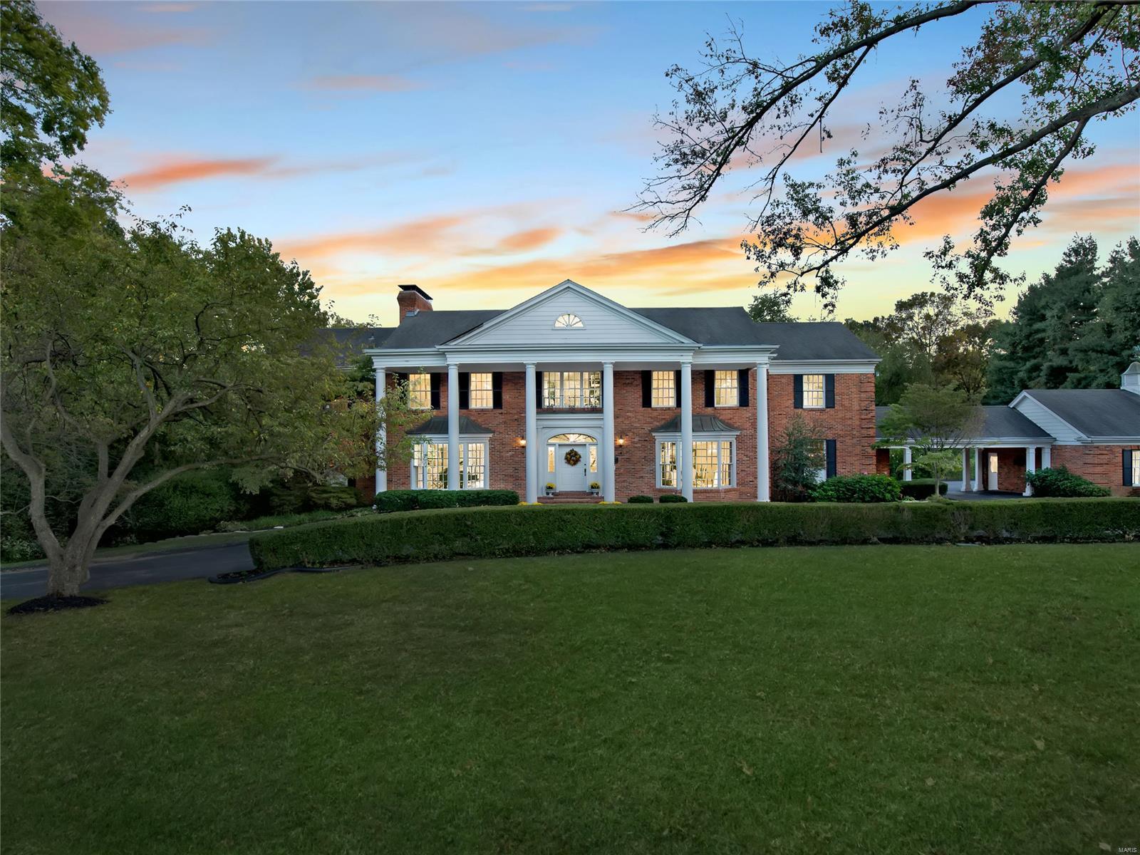 Grand 3 acre estate tucked away on a private lane in a highly sought after Ladue location!  For the first time ever on the market, this one family custom built executive manse will surprise you with it's well thought out open floor plan perfect for today's living!  Extraordinary family home with gracious and open spaces throughout, featuring French doors in each of the main level entertaining spaces that lead to all brick patios overlooking the expansive patios and pool.  Your guests will walk into the two story foyer featuring a breathtaking chandelier and spiral staircase. With over 9700 square feet of living space, 9 and 10 foot ceilings on all three levels, 7 bedrooms, 8 bathrooms and 5 gas fireplaces make this home an exceptional value. The spacious master suite featuring a gorgeous marble fireplace, enormous bath and sitting room. All upper bedrooms have private baths. This home offers a rare opportunity to create your forever home!