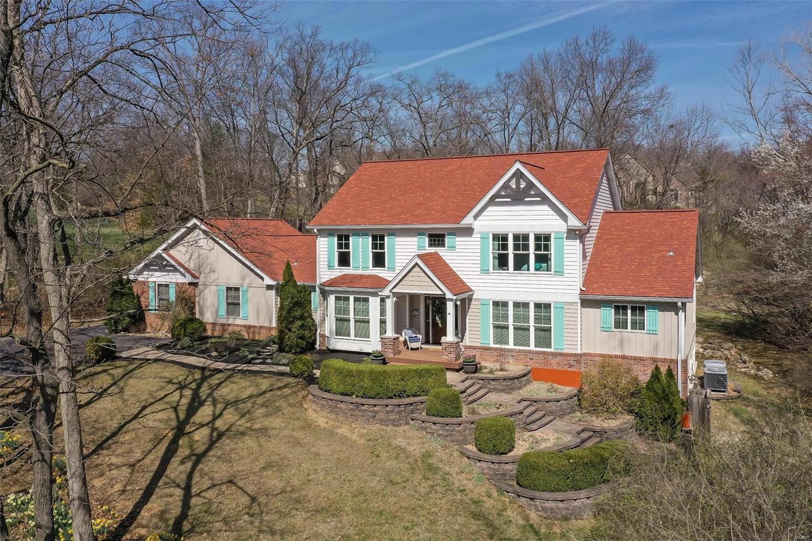Welcome to this updated English Country home featuring 6 bedrooms, 5 baths and enough space for everyone to spread out and find privacy. Located on one of Town and Country’s most private lanes, it’s designed for quiet living on 1.07 acres of beautifully wooded grounds, and convenient to shopping, schools and more. The Main Floor includes Primary Suite, Fam Rm w gas fireplace, Laundry/Mudroom, DR, Kitchen w/ SS appliances, some HW flooring, one of 2 home offices, and spectacular backyard views thru ProVia picture windows.  The UL has 4 bedrooms, divided, sharing two sep J&J baths.  The finished LL w/ walkout has 6th 18’ x 12’ bdrm w/ large windows, walk-in closet. It is currently used as the 2nd home office.  The fin 60 x 17 LL rec room, w/ wet bar, and full bath, is perfect Media Rm or overnight guests area. Zoned Gas & Electric HVACs; Central Vac. Rear entry 3 car garage + oversized parking pad. PRE-MARKET INSPECTION WITH COMPLETED REPAIRS. MAKE YOUR OFFER TODAY WITH CONFIDENCE! Additional Rooms: Mud Room