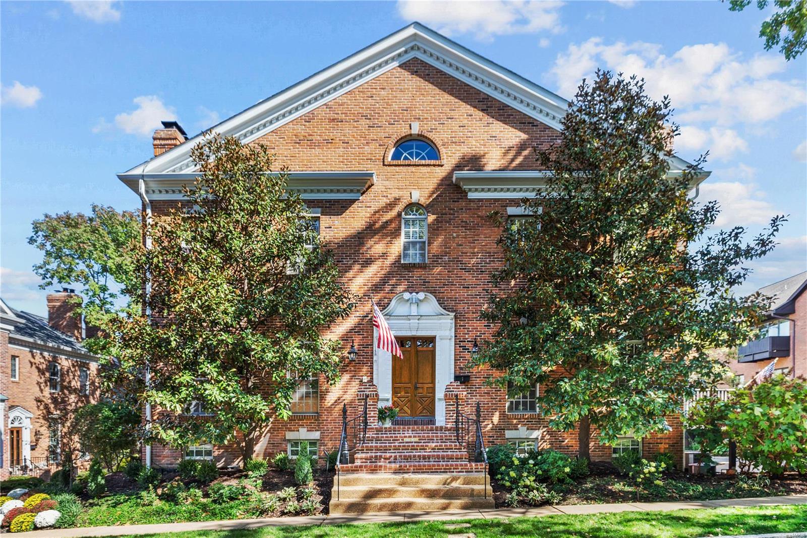 If the ease of condo living, w/proximity to Downtown Clayton, plus an elevator to 3 levels – sounds compelling, this condo will be captivating. Beautifully tended common gardens are the 1st inkling of the caliber throughout. Upon entry – the ambiance of luxury is evident - 10 ft ceilings on the main, molding detail & an open floorplan plus large windows throughout, provides an idyllic backdrop for easy living & entertaining. The LR opens to a DR characterized by recessed lights & bay window. The kitchen w/granite counters, center island, 6-burner gas Jenn Air stove, X2 ovens, & a spacious breakfast rm-opens to a balcony, providing a perfect spot for outdoor dining & leisure. A family rm w/wet bar & main level powder room completes the main. The 2nd floor offers a main bedroom suite w/a large bathroom & ample closet space. Additionally, beds 2, 3 and a 2nd full bathroom comprise the 2nd floor. The LL offers a wine storage area, rec room, full bathrm, laundry rm & 2-car attached garage. Location: End Unit