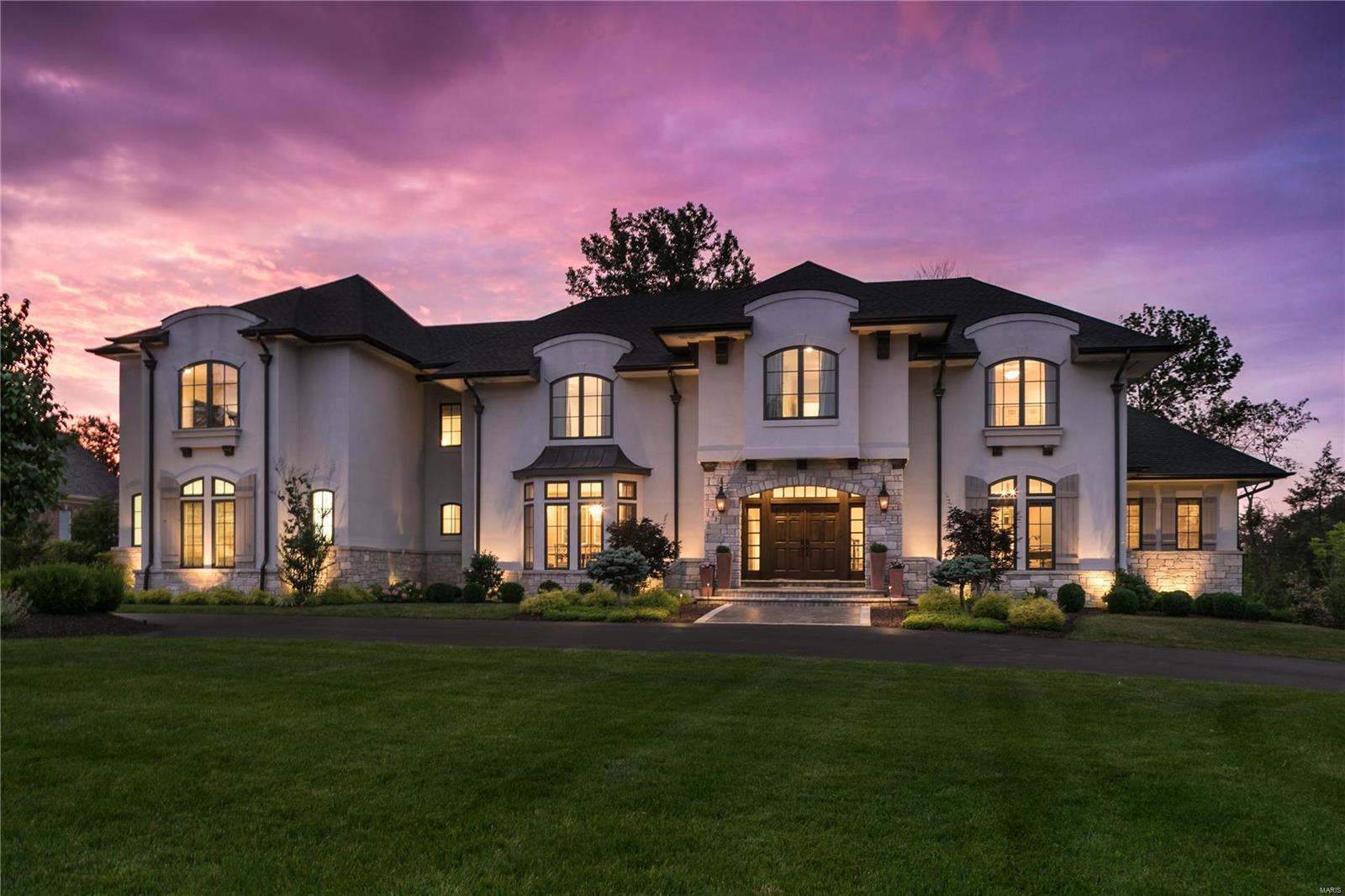 An artistic 8,000 square foot composition of refined finishes and materials, this 5 year old executive Frontenac property exceeds all expectations. Built for functionality, form and fun, the home is a flood of exacting detail; impeccable millwork, arches, a two story kitchen and elegant dining room. Unique Chef's kitchen features crossed rough hewn timbers, lavish butler's pantry, a bright breakfast room and spacious hearth room. Family Room branches off ideally for open living. The Main Level Master retreat is accessed by French doors, with an expansive luxe bath, outfitted with oversized walk-in shower, professionally organized dual closets, and sweeping vanity surface. Second level hosts 4 master sized bedrooms. Walk out lower level is landing zone for the kid's spiral slide. Covered loggia with built in heaters, fire pit and putting green complete exceptional outdoor living. Built in finest quality by R. G. Apel. Geothermal heating/cooling. Ample room for pool. Ladue Schools. Additional Rooms: Mud Room