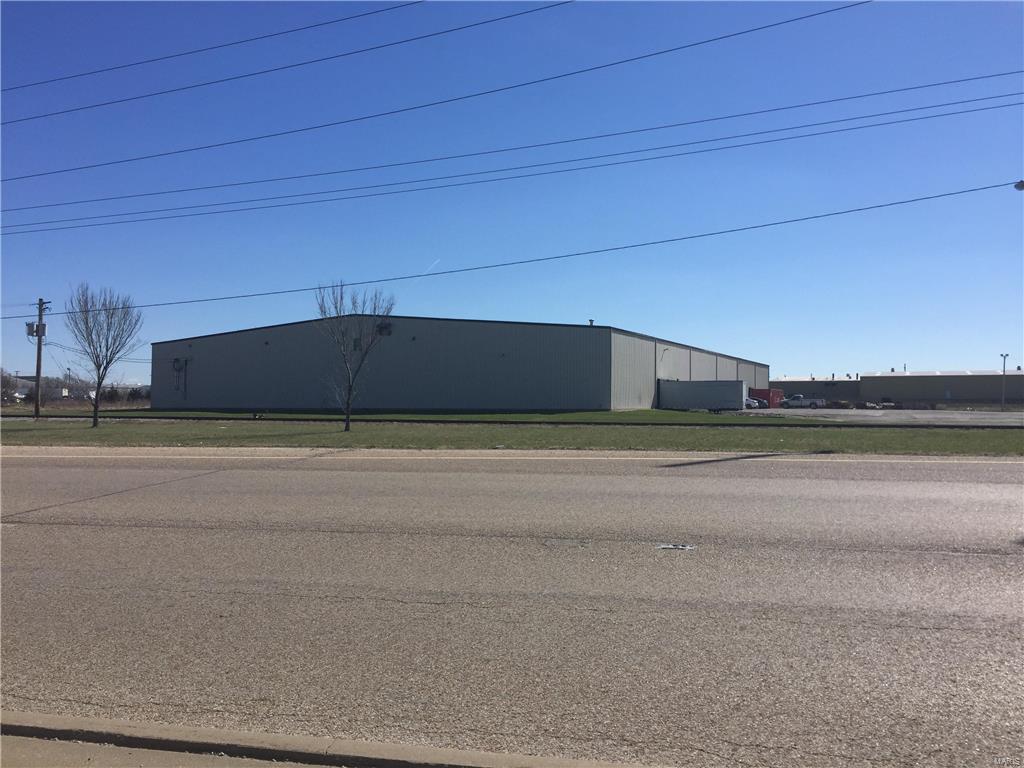 Original 36,000 SF Industrial / Warehouse / Distribution building built in 1981 was expanded by 18,000 SF in 2004. 54,000 SF metal / steel frame construction industrial building offers 7 (10' x 20') pod offices that can be moved with men and women restrooms. (3) 8' x 10' Dock Doors with levelers. 20' minimum - 30' maximum clear height. 25' x 60' bay spacing throughout both warehouse areas with an interior overhead door (10' x 14') for easy access between divisible spaces.  3 phase 480V Electric Service from Ameren. Fully sprinkled building. Prime location visible and accessible from I-55, exit 52.  Rail Access - Burlington Northern Railroad DOT crossing #072292W is spur location off main track in Litchfield.  Property is available for Sale or Lease for $3.00 per square foot NNN.  See attached survey for parcel dimensions and floor plan for layout. Location: Corner Location, High Traffic, Hwy/Interstate Frntg, Industrial Park, Industrial Area
