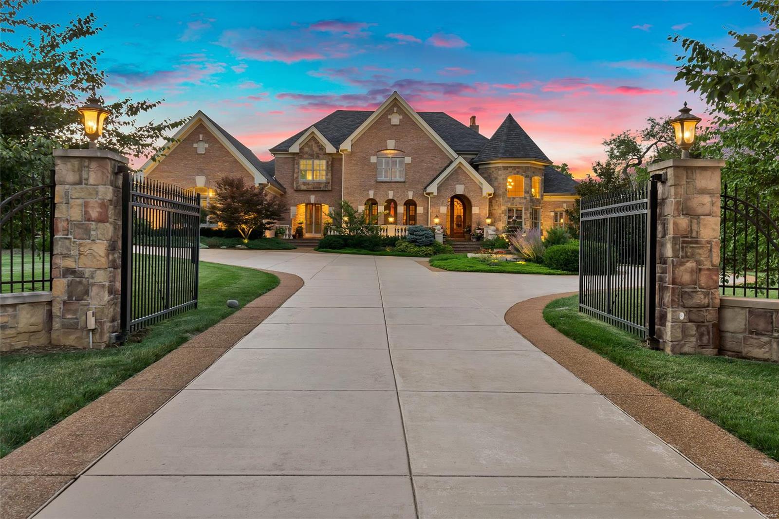 Magnificent 1.5-sty English Country Estate home w/ over 8100 sf of living space! Grand 2-sty marble foyer highlighted by dramatic sweeping staircase leads to private study w/ vaulted HEX ceiling, elegant dining room & spectacular great room w/ architectural columns, marble fireplace & wet bar. Exceptionally large kitchen with cherry cabinetry, commercial grade appliances, double ogee-edged granite center islands & planning center adjoins light-filled breakfast room & vaulted hearth room with floor-to-ceiling stone fireplace. Coffered master bedroom suite w/ sitting room & lavish bath with shower spa & Jacuzzi offers an appealing retreat. Front & rear staircases access 3 additional bedrooms suites & convenient upstairs laundry. Lwr Lev entertainment space includes recreation room w/ fireplace & 18’ wet bar, family room, game room & guest suite. French doors open to outdoor living area w/ resort style pool & hot tub. Situated on 1.34 acre grounds w/ gated entrance & 4-car garage. Additional Rooms: Mud Room