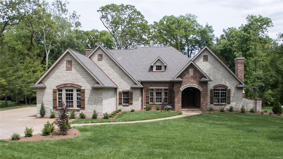 Fantastic Kennerly Custom Homes spec ready for occupancy. 1 acre lot with lots of trees. Brick & stone veneer 4 sides. 4 car oversize side entry garage. Aprox 6073 total square feet of living area. Loaded with custom features. Job stained hardwood. Solid walnut entry door to huge foyer. 3 Fireplaces. Lots of custom trim & crown throughout. Open kit/brk/hearth room. 48" commercial range with griddle, 48" refrigerator. Huge island with marble top. Butler pantry with sink & beverage center. 8x6 walk in pantry. Lots of different ceiling lines. Spacious master has luxury bath with an octagon ceiling, heated flooring & walk in shower. Bonus room upstairs along with 3 bedrooms with private baths & walk in closets. 19x10 mud room between garage & kitchen with cabinetry & cubbies for the kids. Triple zoned HVAC. Lower level is finished with family room & bath. Landscaping, sod, & sprinkler system. Great side porch off laundry to aggregate drive & walks. 28x14 patio. Fire sprinkler system in LL. Additional Rooms: Mud Room