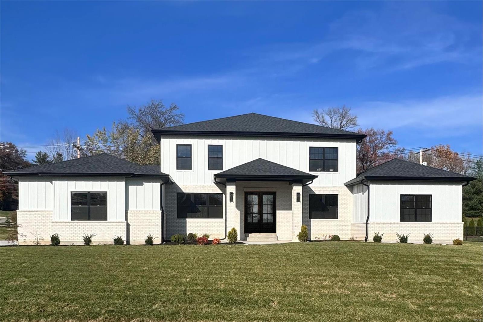 A great opportunity to purchase a new construction in Ladue school district. The 1.5-story design features 6 bedrooms, 5 full baths, and one-half bath, and a 9-foot ceiling height on each level. The main floor boasts a luxurious primary suite with a walk-in closet and a spa-like bath, with heated floors, a soaking tub, and separate walk-in shower. The gourmet kitchen is a chef's dream, featuring a gas cooktop with a pot filler, oversized island, custom cabinetry with additional storage, stainless steel Kitchen Aid appliances.  Hardwood floors thru-out first floor and the family/game room upstairs. All three bedrooms upstairs have a walk-in closets and individual bathrooms in addition to a second laundry room. Finished lower level with two more bedrooms and a full bathroom. 8-foot solid core doors with oversized millwork thru-out the house. Zoned heating and cooling, with tankless water heater, 400 Amp electrical service. Oversized three car garage with built in electric car charger.
