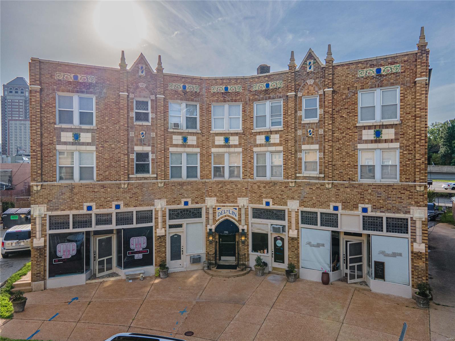 Generational mixed-use trophy asset in between WashU and Clayon. Walk to the Ritz, Wash U danforth, Forest Park and tons more.  This 22 unit property has been beautifully maintained on its exterior and fully gutted throughout: forced heat/central air, new plumbing piping, windows, roof, electric, kitchens, baths and WASHER DRYER IN UNIT. There are a combination of studios, 1 beds and 2 beds + 4 rented commercial tenants on the ground level.  The current NOI is 241,000 and is priced to sell at north of an 6.5% Cap; the building stays 100% leased with mostly students from Wash U.  Current rents are about $250 below market with a proforma NOI north of 400,000; Add some personal touches, update kitchens & baths or just cash your rent checks – this property provides perfect value for someone looking to live & invest in a Class AAA neighborhood with little risk.