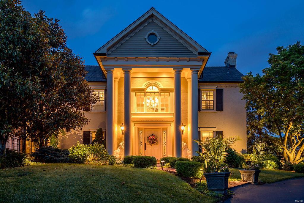 Unique, private & life-transforming in the heart of Frontenac! Meticulously renovated southern colonial manse reminiscent of gracious historic homes in Charleston, spread out on 1.4 acres of manicured grounds, refreshed by a newer heated, salt-water pool, and masterfully redesigned, rebuilt, decked out, stylized, and upgraded, these 5340 sqft will embrace & pamper you in luxury, despite the grand scale & architectural details of design-magazine quality! The main level offers a formal LR & DR, veranda, see-through FRPL between the FR & sitting room, and chef’s kitchen w/ 3 ovens, warming drawer, breakfast room, granite center island & garlands of triple isolated Pella windows. The MA suite with bay window and fireplace and the stunning MBA w/ steam shower, soaking tub & dramatic skylight are elegantly dressed up in multiple chandeliers, marble and quartz. Plus, HW & heated FLs, finished LL, 4-car garage, newer 3-zoned SYS & more. A gardener & bird-watcher delight w/ 4-season flowering.