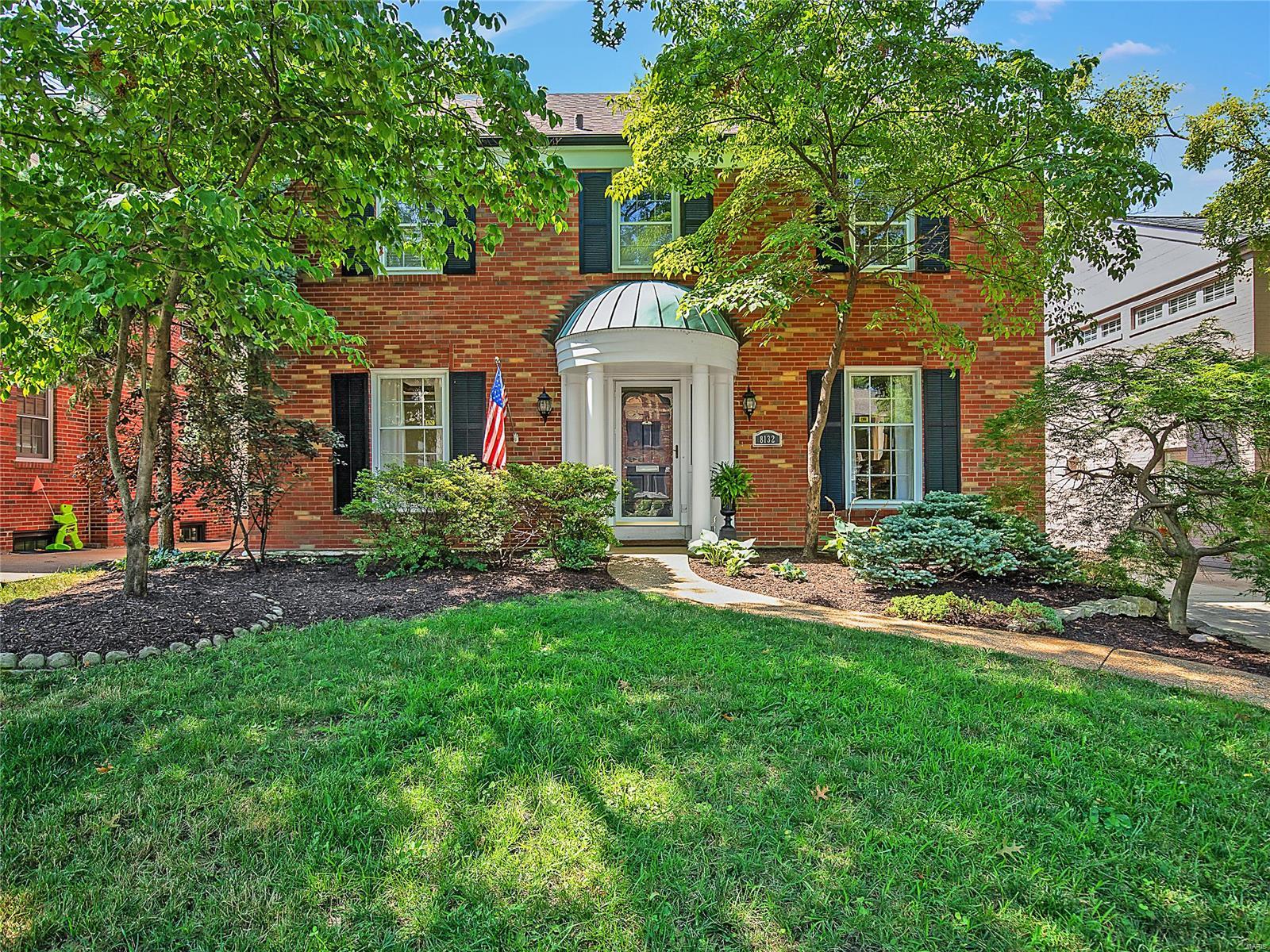 Upon entry, the classic proportions, architectural details & abundant natural light that exemplify this home are evident. An entry opens to the living room & gracious dining room. A main level addition includes a kitchen with generous cabinetry & granite counters & opens to a breakfast & great room – providing an idyllic floor plan. Direct access to a deck makes outdoor relaxation a breeze. A main level bedroom suite, with vaulted ceiling, sets this home apart. A deluxe attached bathroom & walk-in closet will excite anyone looking for ease & elegance. A well sized laundry & powder room completes the main level. The 2nd floor offers a 2nd bedroom suite w/updated full bathroom & walk-in closet. The 3rd and 4th bedrooms & 3rd full bathroom complete this level. The LL rec. room has been finished w/the caliber of finish that is consistent with the home. 2 Car detached garage. All within walking distance of café society & easy access to I/64, Washington University & Barnes Jewish Hospital.