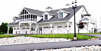Carriage house, 10 rooms in the upper living area. Designed  for 7 bedrooms each w/a private bath, all rms wired for ceiling fans, Master bedroom  has 10'6 ceiling, wood-burn fireplace, walk-in closet and sliding glass doors to 10 x 21 deck overlooking north end of property. Wood burn fireplace in Family rm and living rm. Special features include some vaulted ceilings, some wood flooring, some carpet, 3- decks one of which is screened in, overlooking different areas of the property .Lower level will house up to 14 cars, has work out area, 10x10 sauna made in Finland, and full bath.  7200sq. ft. machine shop which includes 1362sq. ft. 3-bedroom apartment. Great fishing in the 7 acre and 1 acre lakes, with fountains, includes cleaning station and boat ramp. 10,000+ trees planted by the owners, 2+ miles of road within the fenced 100 acres. Covered bridge, bridges with seating areas for those nature watchers, and a helicopter pad.  Too many features to list.