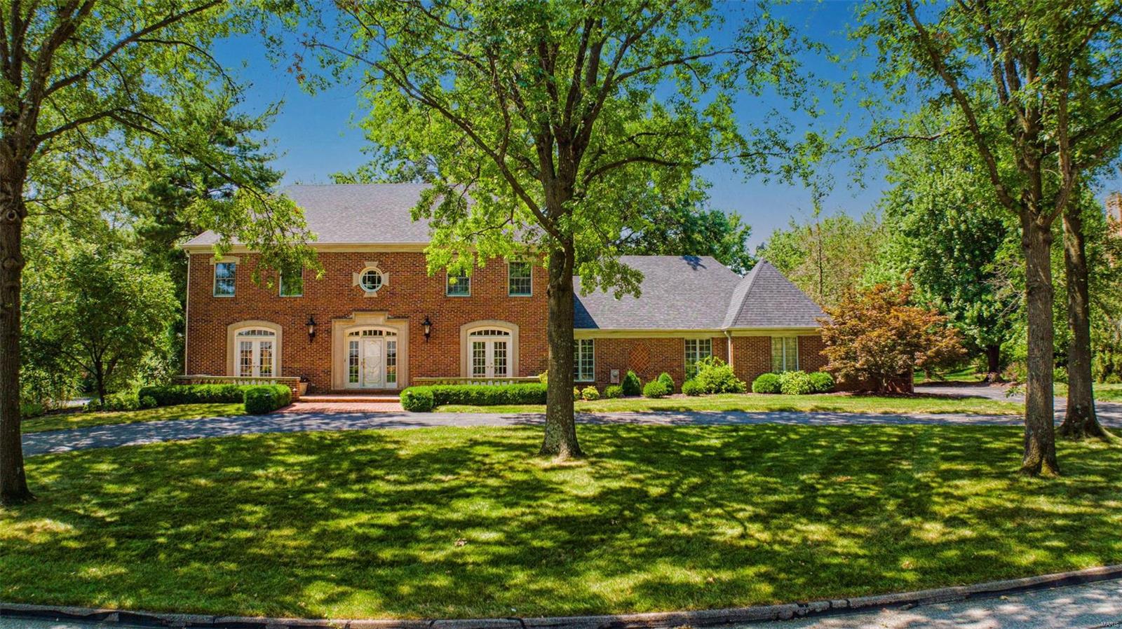 Stately 2 story in Town and Country, located on sought after private lane off Topping Road offers incredible oasis with private pool and stunning curb appeal. Gracious hardwood foyer leads to elegant dining room and living room both with French doors, family room with gas fireplace, built-in bookcases and wet-bar, large eat-in kitchen with double oven and granite counters, main floor laundry. Quality craftsmanship and gorgeous moldings throughout.  Prepare to be amazed by the private backyard oasis!  Large swimming pool, beautiful brick patio with fountain. Spacious primary suite with double sink, separate shower and tub and walk in closet.  3 additional bedrooms and 2 more full baths upstairs.  Nicely finished lower level offers additional living space with rec room, office area, and plenty of storage. 3 car garage and full house generator. Additional Rooms: Mud Room