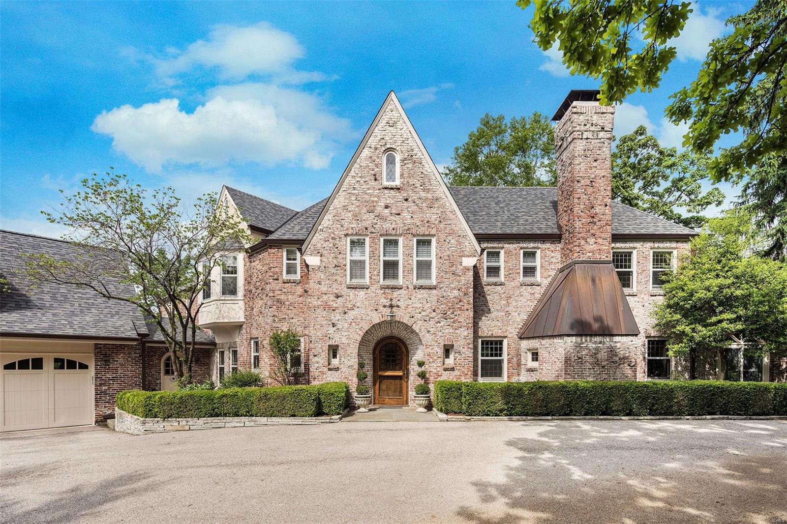 Withdraw until the first of the year **Impressive English Manor on 1.9 park-like acres in beautiful Hampton Park.  The level of taste and sophisticated luxury is unmatched.    From the exquisite architectural detail to the extensive renovations, imagine living in open light-filled space perfect for family living and stylish soirees. Every amenity for today’s lifestyle. Leaded glass, slate & hardwood, 4 fireplaces, chef’s kitchen & butler’s pantry, sunny den off living room, stunning dining room, amazing master suite/bath. Additional 3-5 bedrooms & 3 ½ bths. Information with detailed upgrades and list of exclusions available. Spotless 3 car attached garage w/office/fitness area above.  MOVE- IN READY. Minutes from Clayton, Park & downtown. A truly exceptional offer.