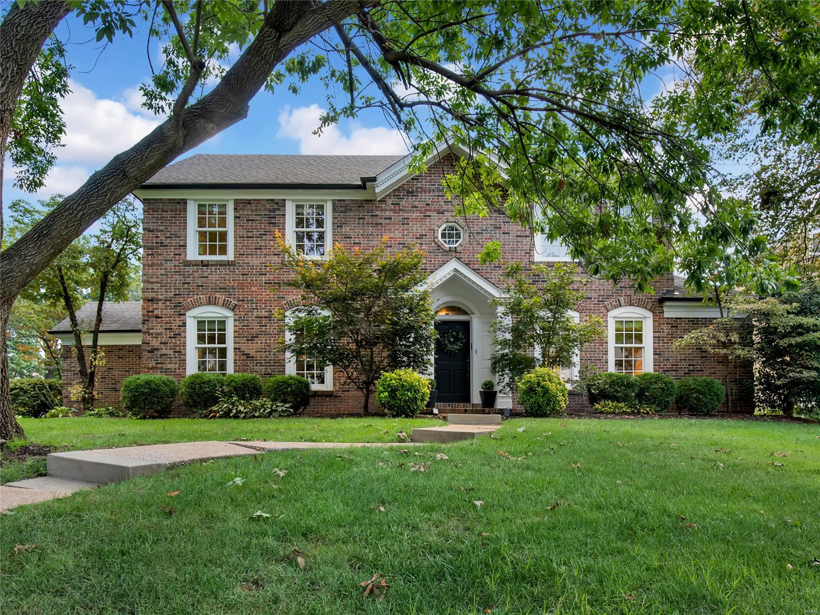 Set within the heart of the exquisite tree-lined Lake Forest subdivision (Clayton Schools!), this 2-story embodies sophistication. The center hall opens to a LR & handsomely sized DR. The open-design gourmet kitchen, breakfast room & family room w/French doors to the patio & backyard, is where family & friends will gather. The kitchen w/vaulted ceiling, Dacor x6 burner gas stove, granite counters & abundant cabinetry makes life magical. Access to a mudroom & 2-car garage is ideal. The main level den offers an option for a bedroom-suite w/access to a full bathroom & walk-in closet. A handsome staircase takes you to the 2nd level that comprises a luxurious master suite w/sitting area, walk-in closet & updated crisp-white bathroom. Bedroom 2 and 3 and a 2nd full updated bathroom completes the 2nd level. The LL offers a large rec. area, wet bar w/sink & ample counter space, bonus room, 4th full bathroom & plentiful storage. Easy access to Downtown Clayton, I-64, shopping & schools. Additional Rooms: Mud Room