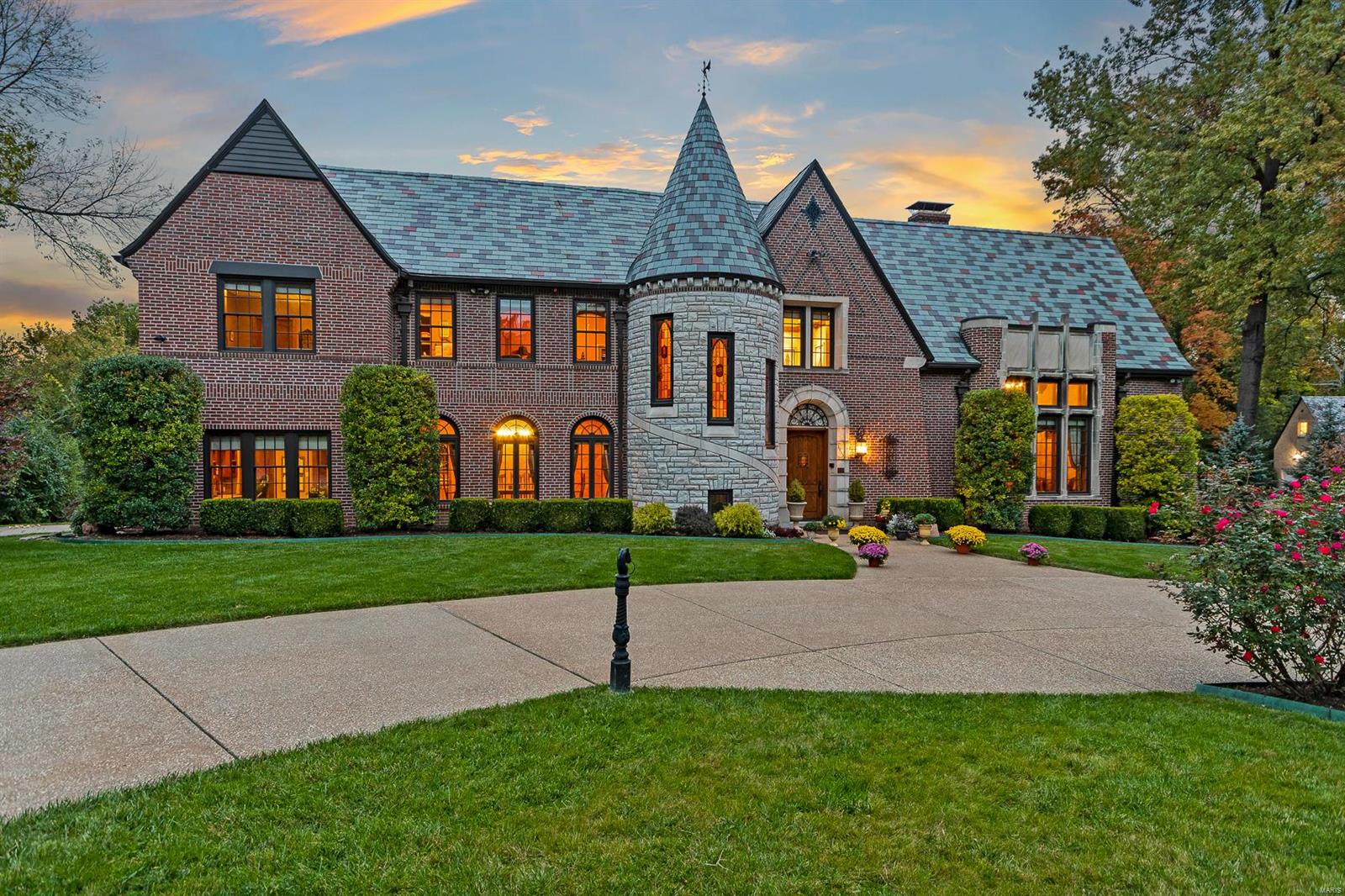 Magnificent French Norman residence on 1.46 acres in Hampton Park! Superior craftsmanship & renovation/addition in 2010 combine to create this private sanctuary with 8748 sq ft.of living space. Architectural features include a stunning entry, winding staircase, 2 sty living room with massive fireplace, balcony, period chandeliers, terrazzo floors &  dining room. The convenient 1st floor office could be a 4th br. The kitchen, with top of the line appliances, center island & butler's pantry with wine room, opens to the family room. Upstairs are 2 brs & a large master suite with cathedral ceiling, deluxe walk in closet, & luxurious bath. The lower level is a knock out with many dedicated spaces, work out room, rec. room, hobby area, safe room, & a 12-14 car garage! A huge new patio overlooks the amazing 60'x 90' koi pond with waterfall! Enhanced security system, heated floors, newer pella windows, generator, & partial geo thermal heating. A unique home with meticulous attention to detail! Additional Rooms: Wine Cellar