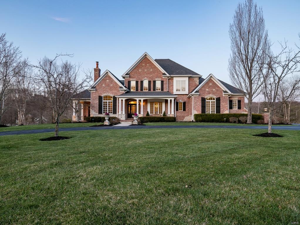 Custom 1.5sty on 3+ beautifully landscaped acres! 5 Bds, 4.5 Bths & 5600+ sqft of living spc w/LL. Gorgeous front door & Foyer; Study/Office w/FP & library w/wet bar; Dining Rm w/crown molding & Living Rm w/see-through gas FP. 2sty Great Rm w/box beam ceiling, see-through FP & built-ins; gourmet Kitchen w/maple cabinets, granite, island/breakfast bar, SS appliances, pantry & Breakfast Rm. Coffered Master Ste w/walk-in closet, luxury Bth & private patio. Also MF Powder Rm & Laundry Rm. Incredible staircase to 2nd Flr w/Loft, 3 Bds (1 en-suite & other 2 share Jack/Jill Bth). W/O LL w/10ft ceilings, wet bar, 5th Bd & full Bth. Highlights: newer roof (2015), zoned HVAC, newer WH, freshly painted, newer floors, central-vac, custom millwork, alarm, sprinklers, circular drive & 3-car side-entry garage. Picturesque outdoors w/deck, heated pool w/waterfall & professionally landscaped grounds. Amazing home for entertaining! Great location! Easy access hwys! Rockwood Schools!