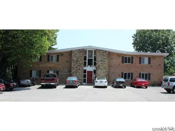 Well tuned investment!  Units are 100% leased for a turnkey transition. All brick building near downtown Edwardsville. Sixteen total units, all have 2 bedrooms/1 bathroom. Coin operated washers/dryers in basement. Owner pays water/sewer/trash. Locked mailboxes inside of building. Spacious commons area throughout the middle of the building. All but 3 units have been updated to include the following new items: Central A/C, kitchen, bathroom, windows, granite countertops, stainless steel appliances, electrical panels, hardwood flooring throughout, updated lighting & cabinetry. Rent ranges from $600-$825 per month. Units 3, 9, and 16 have no disposal, no refrigerator, no microwave and no dishwasher. Units 3, 9 and 16 are on fuses; fuses are up to code. Remaining units are on circuit breakers.  AGENT INTEREST.  Before making an offer on any property, buyer should independently verify all MLS data, which is derived from various sources and not warranted as accurate.