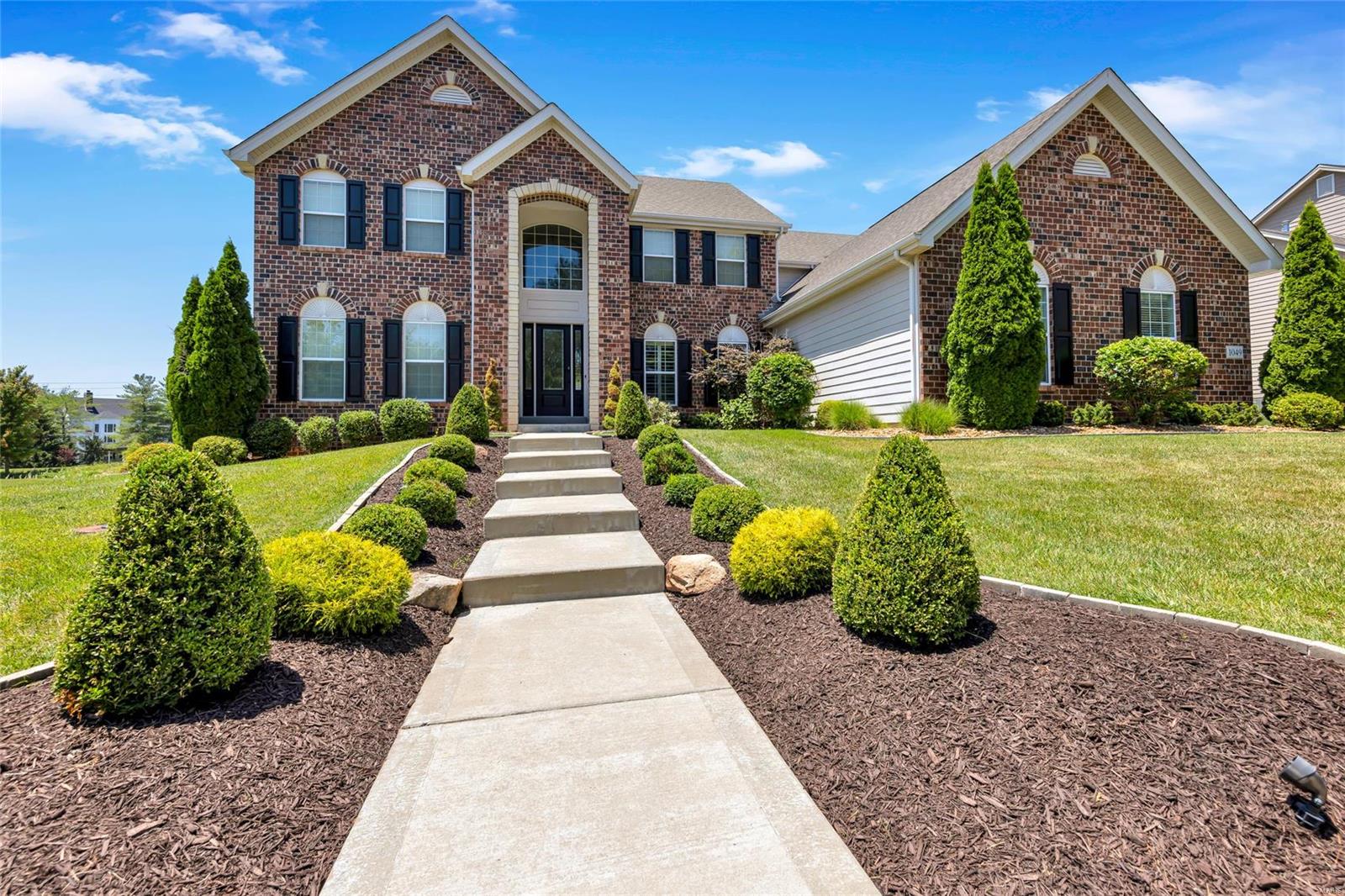Welcome to 1049 Arbor Grove Court. Stunning 4 bedroom, 4.5 bathroom residence greets you with brick and stone facade, lush landscape and offers over 5,300 sq.ft. of living tucked on a .586 acre lot. Step into the grand foyer, flanked by formal staircase and elegant dining that flows into the two story great room with window wall and gas fireplace. Transition into the light filled breakfast room and gourmet kitchen, boasting custom cabinetry, large center island, stone counters, SS appls. and walk-in pantry. Expansive primary suite with luxury ensuite bath and walk-in closet, as well as a laundry room, complete the main level. Upstairs find 3 spacious bedrooms, 2 full baths and a large bonus flex/room. Lower level includes additional finish, including a rec. space, full bath, sleeping area and ample storage. The level, fenced backyard is perfect for relaxing - paver patio with custom pergola. 3 car garage, Rockwood School District, prime location with access to Chesterfield amenities!
