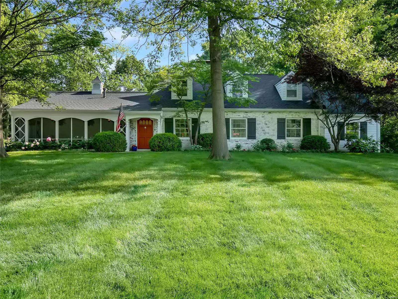 Welcome to this beautiful Cape Cod charmer! Nestled in the heart of Frontenac on a quiet, tree lined, cul-de-sac is 21 Georgian Acres. This classic, white-wash brick home welcomes you with a stately living room and cozy FP.  It opens into a handsome office w/ gorgeous herringbone wood floors. The first flr also has a large formal dining rm, family rm w/ vaulted ceilings, inviting screened-in porch & large kitchen with FP and breakfast rm! There are 2 full baths, 2 large bedrooms, & incredible master en-suite w/ 2 walk-in closets. The master BR opens to a private deck perfect for a quiet morning coffee.  The 2nd floor offers two large additional beds & full bath. Outside, you are immediately impressed by the park-like, acre, level lot. The 3-car oversized garage has an incredible carriage house with full bath, kitchenette, & sleeping area. It is the perfect spot for visiting guests or a private work from home space. Rarely do you find a home with such charm, character, & natural beauty.