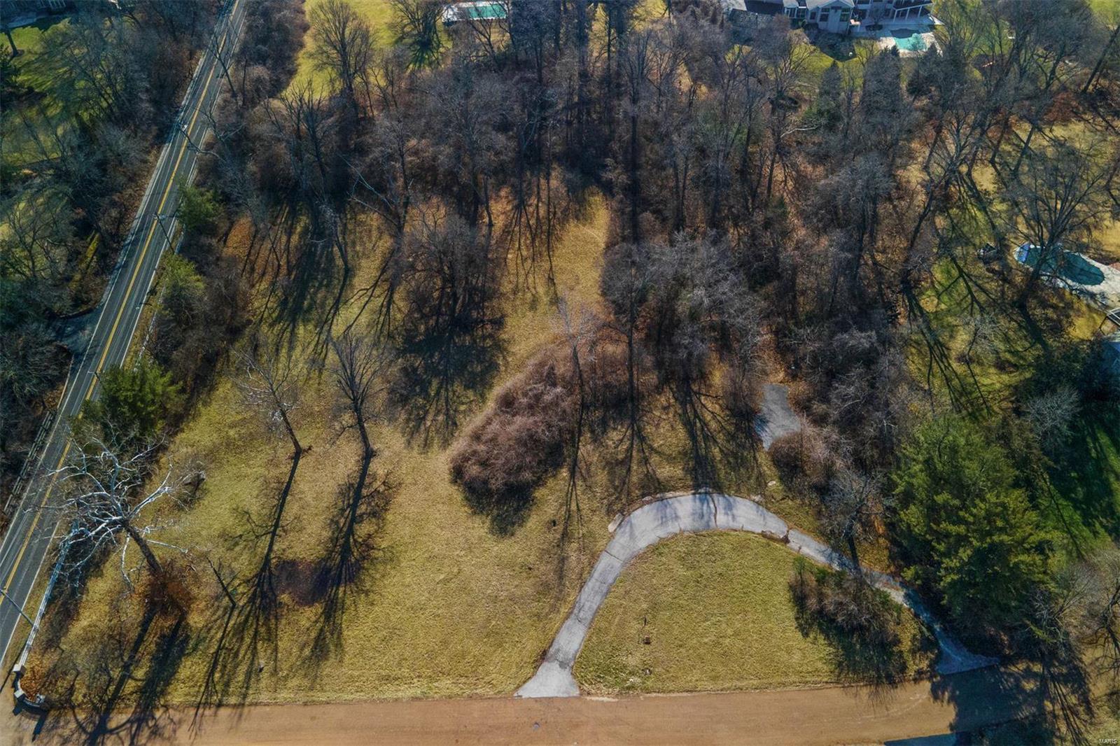 Over $200,000 Price Adjustment! Build your dream home on this 3-acre lot located in a prime subdivision in the heart of Ladue. Lot can accommodate a 5,000 Sq Ft house plus pool. Seller did have plans approved by the City of Ladue although chose not to build. Survey available upon request. Additional Rooms: In Platted Subdv.