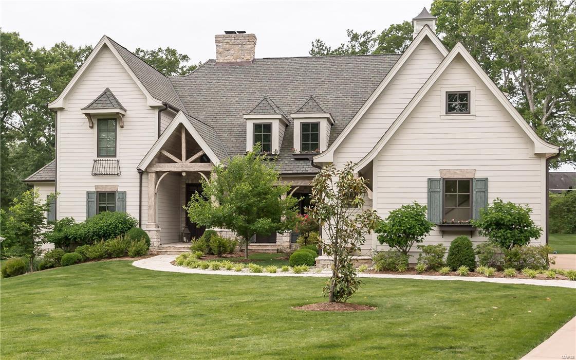 Unique floor plan offers a rustic vibe, outside living area & additional live-in quarters. Hardie board siding, custom shutters, architectural roof, arched doors & numerous French doors enhance the home’s front elevation. Custom amenities including bluestone entry, newer wide plank hardwood flooring & vaulted ceilings are featured throughout. State-of-the-art kitchen w/ soapstone & Carrera marble countertops, 42” glazed cabinetry, Wolf & Asko appliances & ctr island w/ breakfast bar adjoins HR w/ floor-to-ceiling stone fireplace. The coffered Mstr ste offers an appealing retreat w/ fireplace, customized WI closet, beautiful mstr bath w/ Jacuzzi & adjacent study w/ custom built-ins. The 2nd floor offers 3 addl bedroom stes w/ generous room dimensions, FR, 2nd laundry & guest ste w/ private entrance. Nestled on a private .96 acre lot w/ salt water pool, spa & flagstone patio w/ fireplace. Geothermal systems.