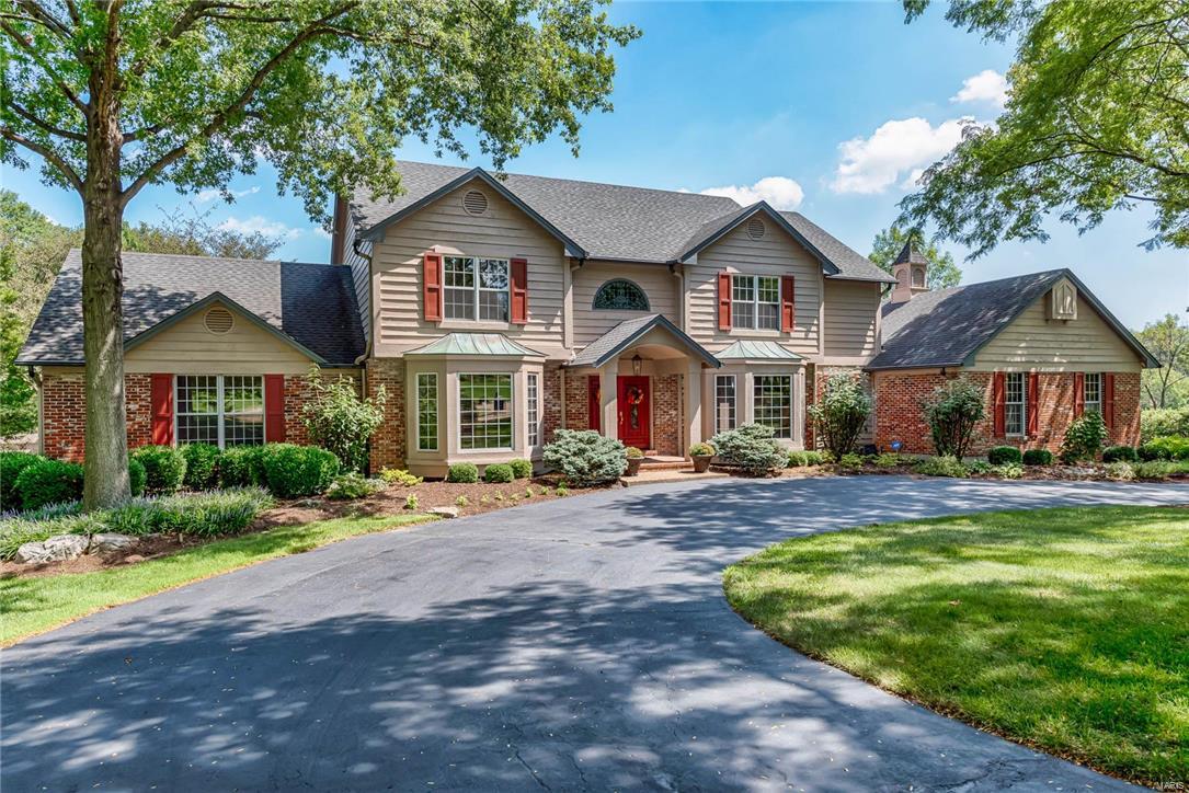 This 5 bedroom home, majestically situated on an acre lot surrounded by beautiful gardens and landscaping includes a saltwater Pebble Tec pool, koi pond and deck. The interior is full of personality brimming with rich appointments and quality upgrades. The heart of the home is the richly appointed gourmet kitchen with top of the line appliances and an expansive center island. The light filled breakfast room enclosed by casement windows provides views of the gracious grounds. The main floor is rounded out by the family room with bar, office with recently added French doors, 2 en-suite bedrooms, plus the laundry room. The attention to detail carries on to the 2nd floor extensive Master bedroom suite together with seating area, workout space, his/her sinks and tremendous walk-in closet. This past year a new AC, furnace and a plumbed gas line to outdoor grill were installed.  Come see this extremely warm and inviting home sitting in a private cul-de sac.