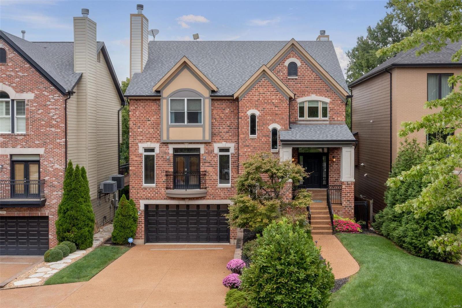 Walking distance to downtown Clayton, this luxurious home offers everything you could ever wish for! The backyard oasis features a spacious deck overlooking the exquisite pool, impeccable landscaping, hot tub & Sportcourt. The entire house is hardwired with video, audio & lighting systems. This home is an entertainers dream! Inside you will find 9 foot ceilings, crown molding, transom windows, custom closets throughout, tray ceilings & much more! The gourmet chefs kitchen is equipped w/ Viking Professional series appliances, custom cabinetry, wet-bar & incredible walk-in pantry. Hearth room w/ gas fireplace & 2 french doors. Living room w/ built-ins, gas fireplace & french door out to the front balcony. The main suite features a huge walk-in closet & spa bathroom w/ a whirlpool tub & steam shower. Every bedroom has an ensuite bathroom & walk-in closet. The walk-out lower level has a second laundry room, bar & media room. Irrigation system, Landscape lighting, Central Vac System.