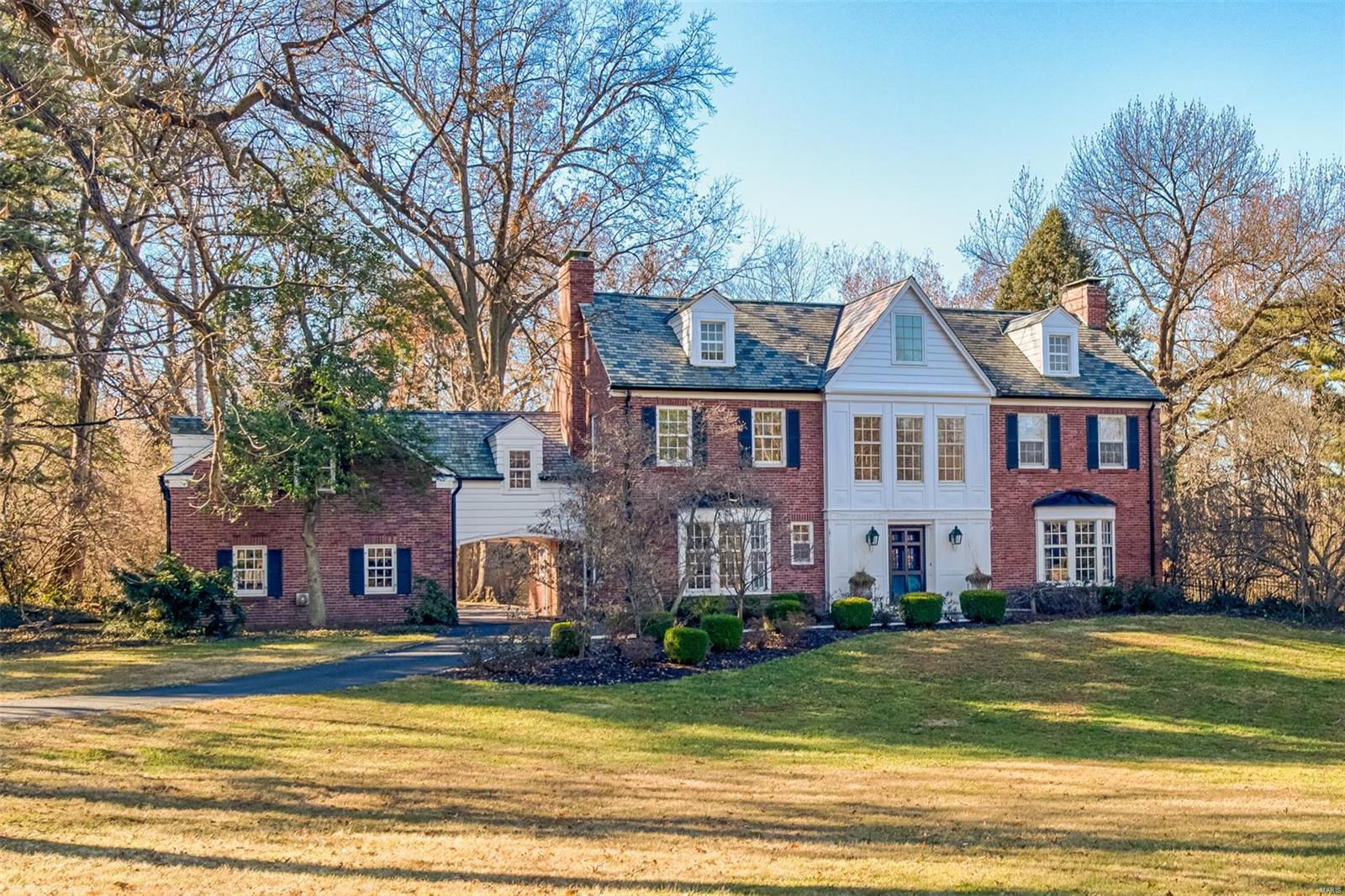 Located in sought-after Hampton Park is this stylish home with striking Art Deco design. The home is set on 1.67 acres backing to other private lots. As you enter the home you will be enchanted by the sweeping staircase in the foyer. The living room is large and bright with wood burning fireplace & bay window. The dining room that has been opened up to the kitchen creates a dynamic space, ideal for casual living. Off of the dining room is a log cabin-styled screened porch reminiscent of Busch’s Grove. Gourmet kitchen with peninsula island, gas Wolf 5-burner cooktop, Sub-Zero refrigerator, Wolf double ovens & steamer. The master bedroom suite features a dressing room and closet, sitting room with fireplace and a new master bathroom featuring a waterfall/overflow tub, large open shower and heated floors. Third floor recreation space. 2nd floor laundry room. 2 car garage attached by a porte cochere. Lower level features plenty of storage and a recreation room with fireplace. Additional Rooms: Mud Room