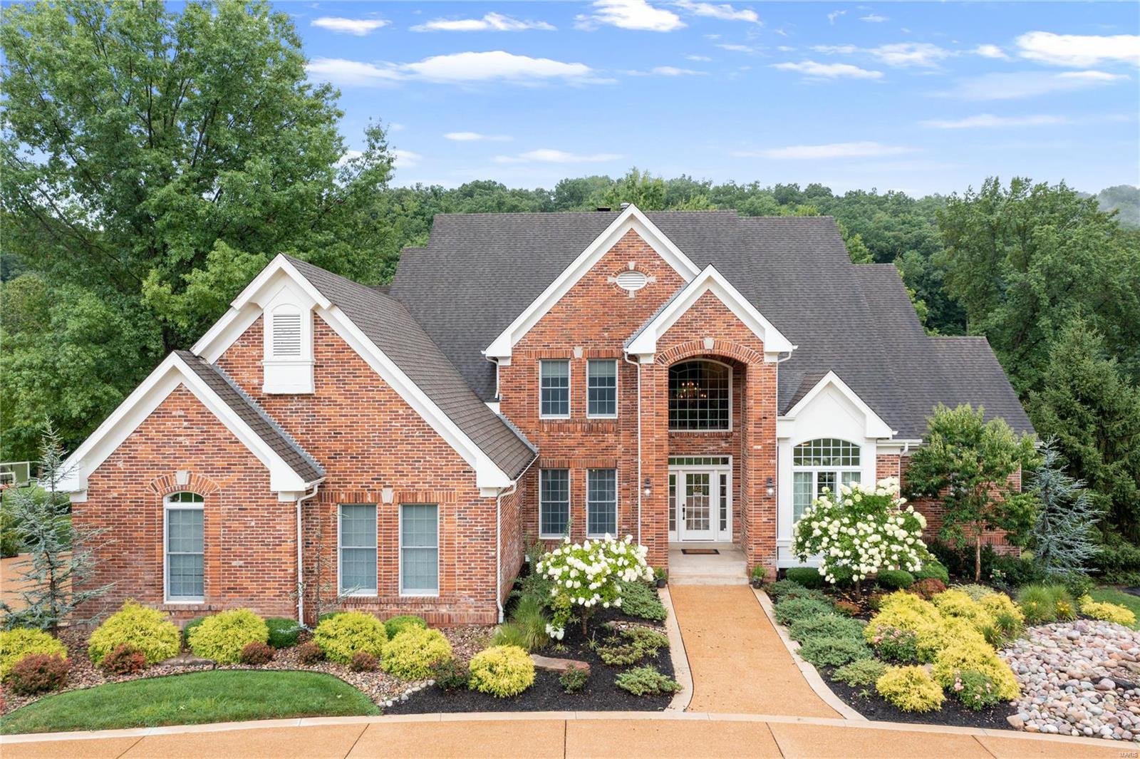 This lovely home offers DeShetler construction quality paired w/a breathtaking & scenic golf course view. A complete kitchen remodel w/newer Bosch & Subzero appliances, suede finished granite countertops, & hexagon shaped breakfast room w/cone shaped ceiling makes this open kitchen a cooks dream. Walls of windows on the rear of the home take in all the views and lush landscaping. The Primary Suite has his and hers finished walk-in closets and an enormous bathroom. There is much crown molding thruout including second floor hallway and foyer. The Den/Study has vaulted ceiling & wall of built-ins & lighted art niche. All bedrooms are ensuite & there is a large loft/family room perfect for the kids or 5th bedroom if needed. There is a back staircase to kitchen. Garage is oversized w/heater. Second washer/dryer hook-up in lower level to accommodate pool. Finished LL has bar, theater rm, workout space & walkout. Sellers watch annual 4th of July Fireworks from the pool.