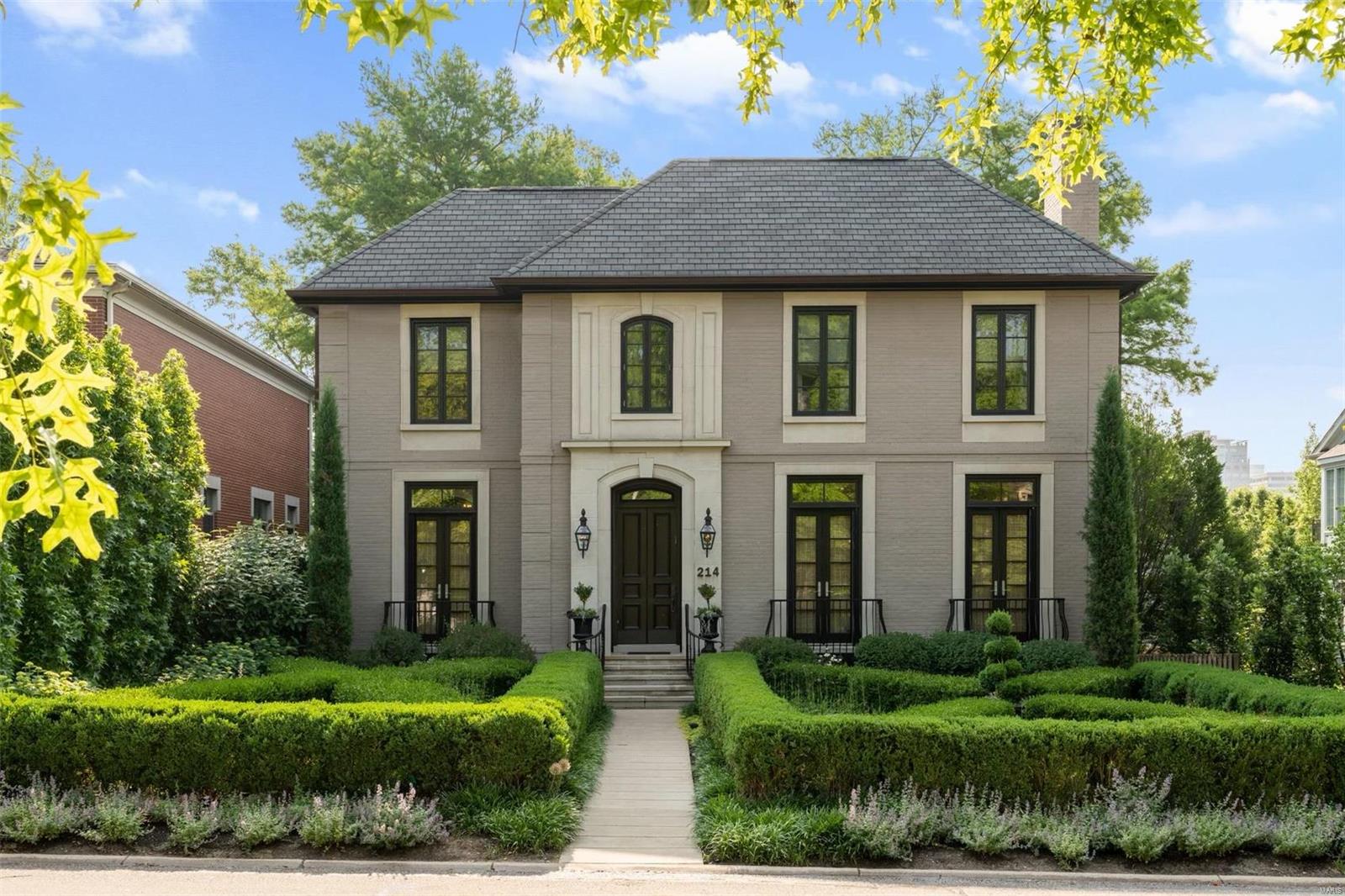 Sophisticated Neo-Classical exterior has exceptional designer finishes throughout this spectacular home. Selections are custom & high end from Venetian plaster entry walls to wood windows, doors, walnut hand hewn floors, wine cellar, elevator, & more. Open living space on the main floor allows for a flexible lifestyle. The dramatic great room accommodates the dining area, which is great for entertaining. The state of the art kitchen opens to the casual dining area & hearth room. French doors open to a lovely terrace lining the back of the home. Finishing off the main level is the library with chocolate mohair fabric-lined walls. The primary bedroom suite with a French balcony has 2 separate bathrooms & 2 walk-in closets! Two additional bedrooms & a laundry room complete the upstairs. The lower level has a generous fitness center with full bath/steam shower, a 2000 bottle temperature controlled wine cellar, & a 3-car garage. Great location, walkable to everything Clayton has to offer! Additional Rooms: Wine Cellar