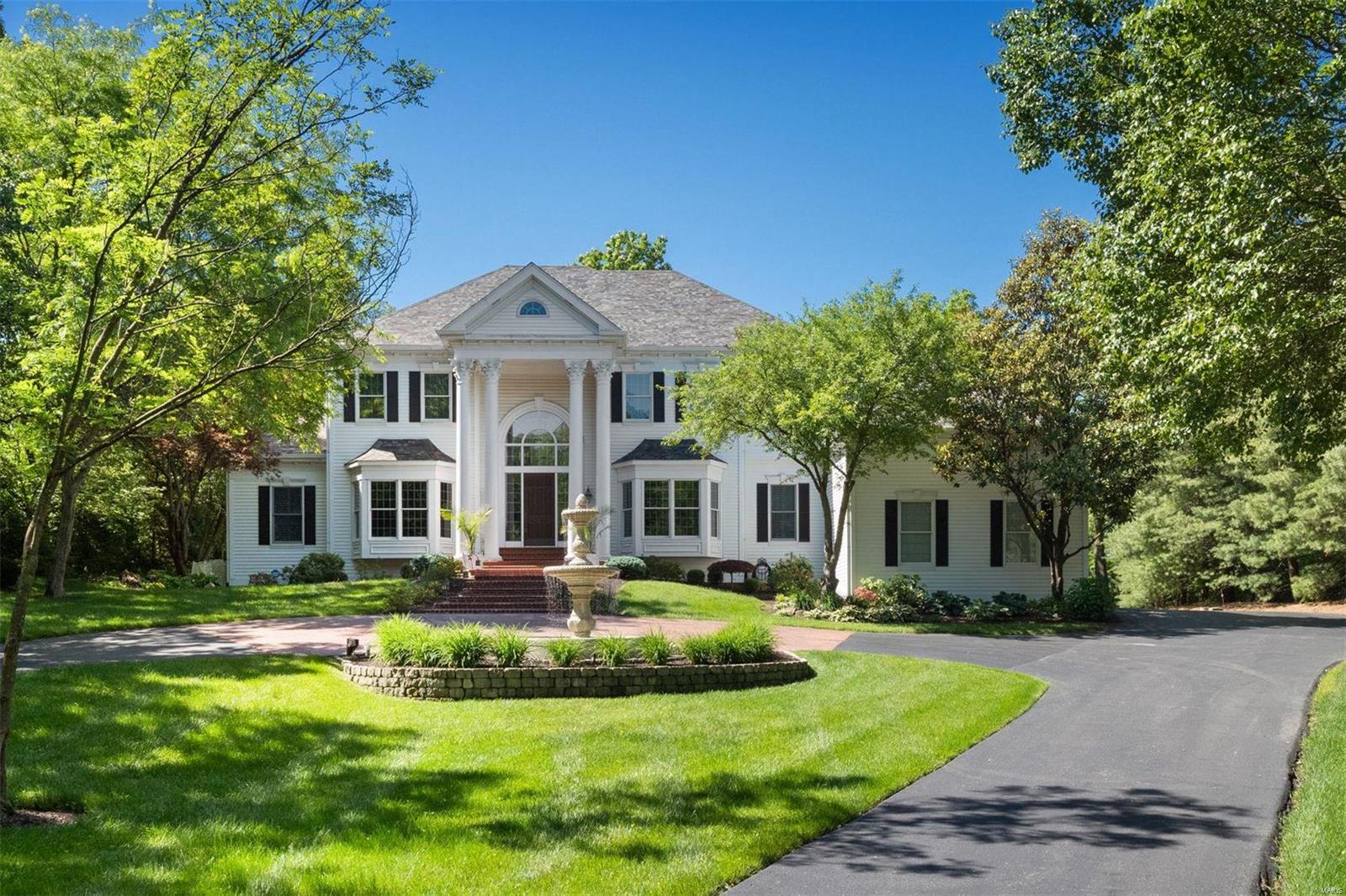 Fall in love with this one-of-a-kind 3-acre estate in Town and Country. Expansive first floor offers grand
marble two-story entry with sweeping staircase; light-filled living room with window wall, premier oversized
moldings, fireplace and bar; stunning gourmet eat-in kitchen with upgraded appliances, designer tile
backsplash and hood open to impressive hearth room with vaulted wood beamed ceiling and walk-out patio.
Three car garage enters to large mudroom plus laundry and half bath. Relax in the private first-floor master
suite with his/her closets and luxurious marble bathroom. Second-floor is complete with three bedrooms and
two full bathrooms. Fully-loaded lower level boasts full kitchen and bar, three family rooms and two
fireplaces. Host all of your favorite people this Summer on your stunning walk-out patio with pool, fountain
and hot tub. Move-in ready with beautiful hardwood floors, updated systems, newer roof and Kirkwood
Schools! Additional Rooms: Mud Room