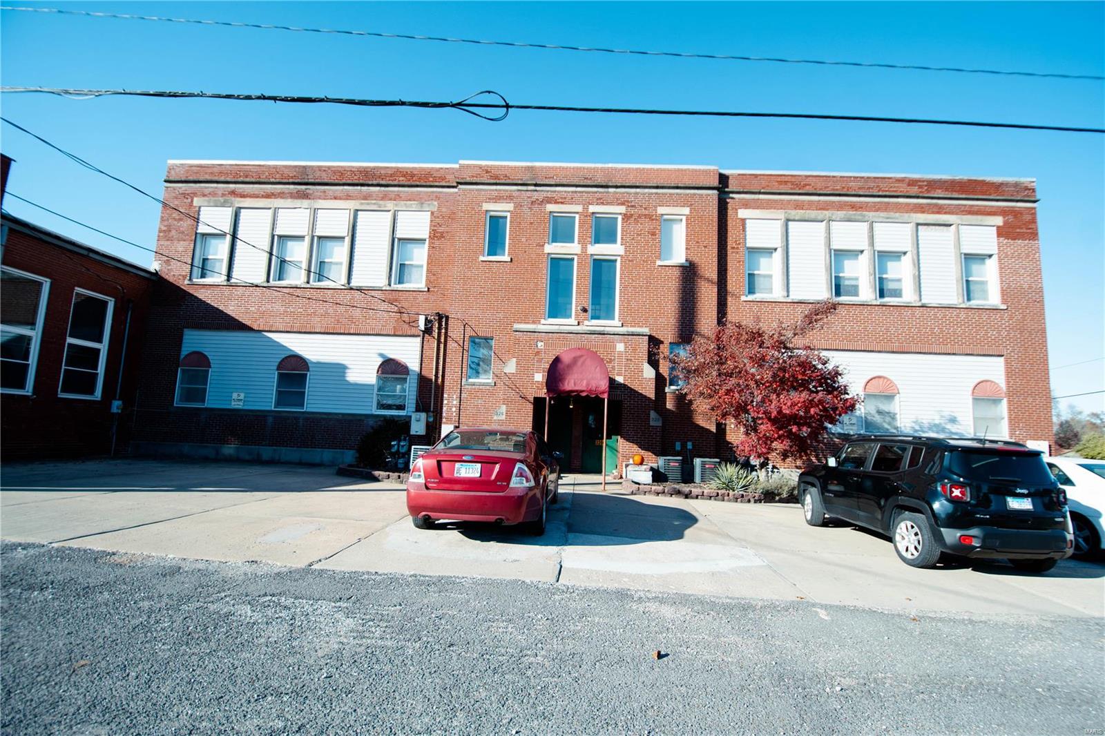 Excellent income producing real estate in this 30+ unit complex.  You'll love the historic charm that has been maintained in the wide old school stairwells, wood floors, exposed brick walls in many areas, and original transoms.  Each floor has washer/dryer units along with some apartments having their own.  Many different layouts available to tenants. It has been well maintained and boasts many updates. These apartments have operated at full or near full capacity under current ownership for several years.  The large rear unit is a perfect home for owner/manager with multiple living levels including a glassed in porch and spiral staircase leading to an open party room.  Definitely a  unique complex that is a must see for any investor. Location: Other
