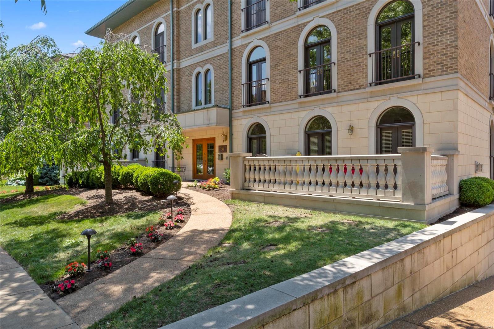 An architectural marvel featured in St Louis Homes, this tastefully decorated two story penthouse offers a warm and inviting open floor plan with 3 terraces with city views. With 4,000 square feet of living space, three bedrooms and three-and-a-half baths and a flexible floor plan which can be amended for your private lifestyle. Gorgeous open kitchen with granite counters, SubZero, Wolf and Asko appliances opens to a large ensuite bed or family room with built-in bookcases, wood floors, and gorgeous full bathroom.  The unit has nine foot ceilings, oversized moldings, Palladian windows, see through- double sided fireplace and wet bar. The spacious master suite with luxury bathroom, abundant closet space spanning almost the length of the condo and sitting area opens to a large top level terrace. Secured entry, elevator, heated 2 car garage and steps from Shaw Park. The best location in all of Clayton. Location: City, End Unit, Upper Level