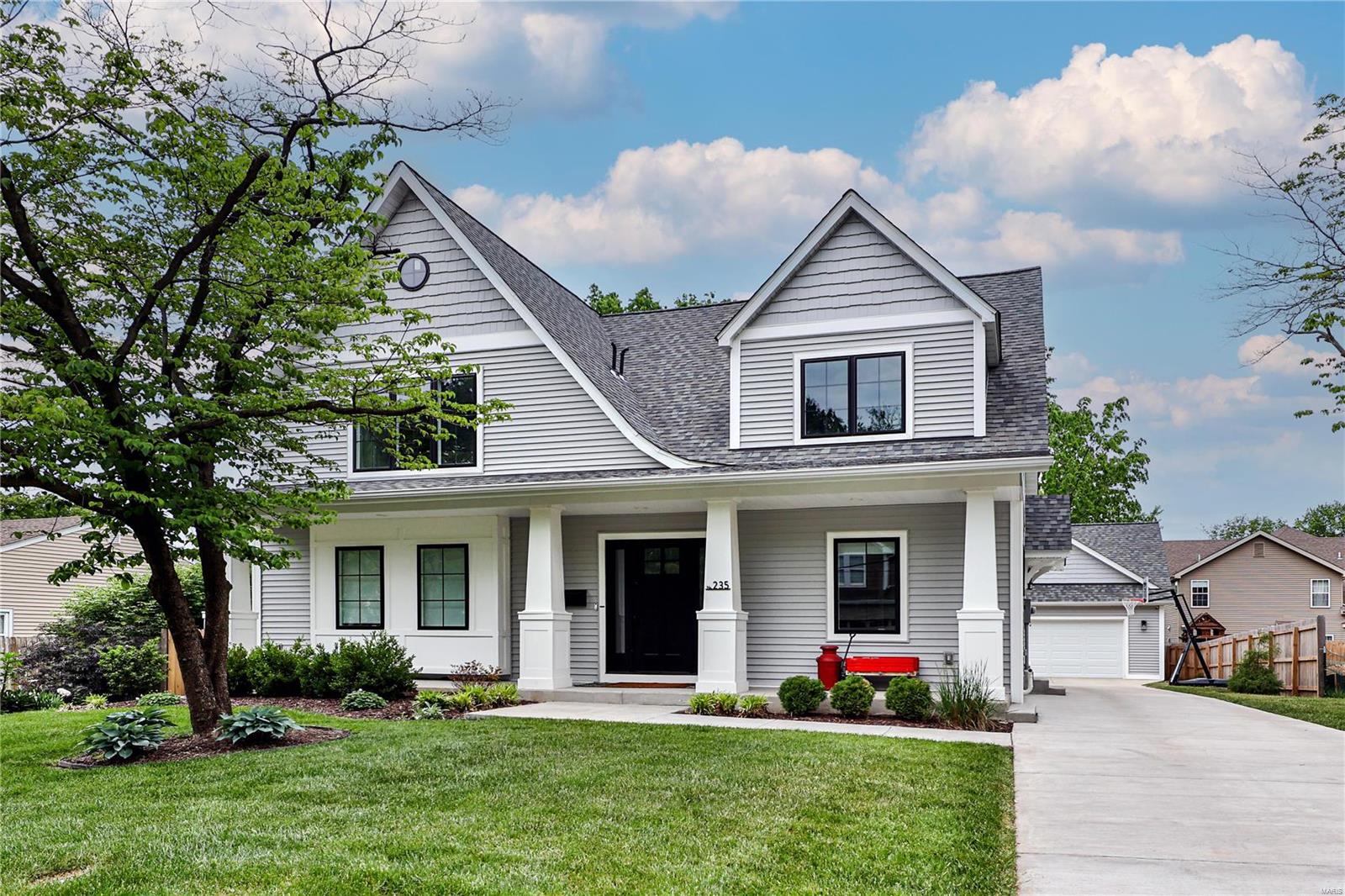 Open Sunday 1-3  Beautifully appointed custom-built Kirkwood home is exactly what you have been waiting for.  Upon entering you are greeted with beautiful hardwood flooring,custom millwork,spacious entry and office/music/bonus room to your right. Owners created a well thought out kitchen design with recessed farmhouse sink and open shelving, induction range w/hood, dbl ovens, quartz countertops and an island that seats five. The adjacent dining room and huge family room w/fireplace & built in cabinetry are flooded with natural sunlight and overlook private, fenced back yard.  Convenient mud room w/built in lockers open to driveway that leads to oversized 2 car garage. Primary bedroom offers walk in closet and bath w/dbl vanity & oversized shower. A powder room completes the main level.  Upstairs you will find three large bedrooms, two full baths & owner’s “art room” which could be converted to another bedroom. Partially finished lower level offers additional rec/play space